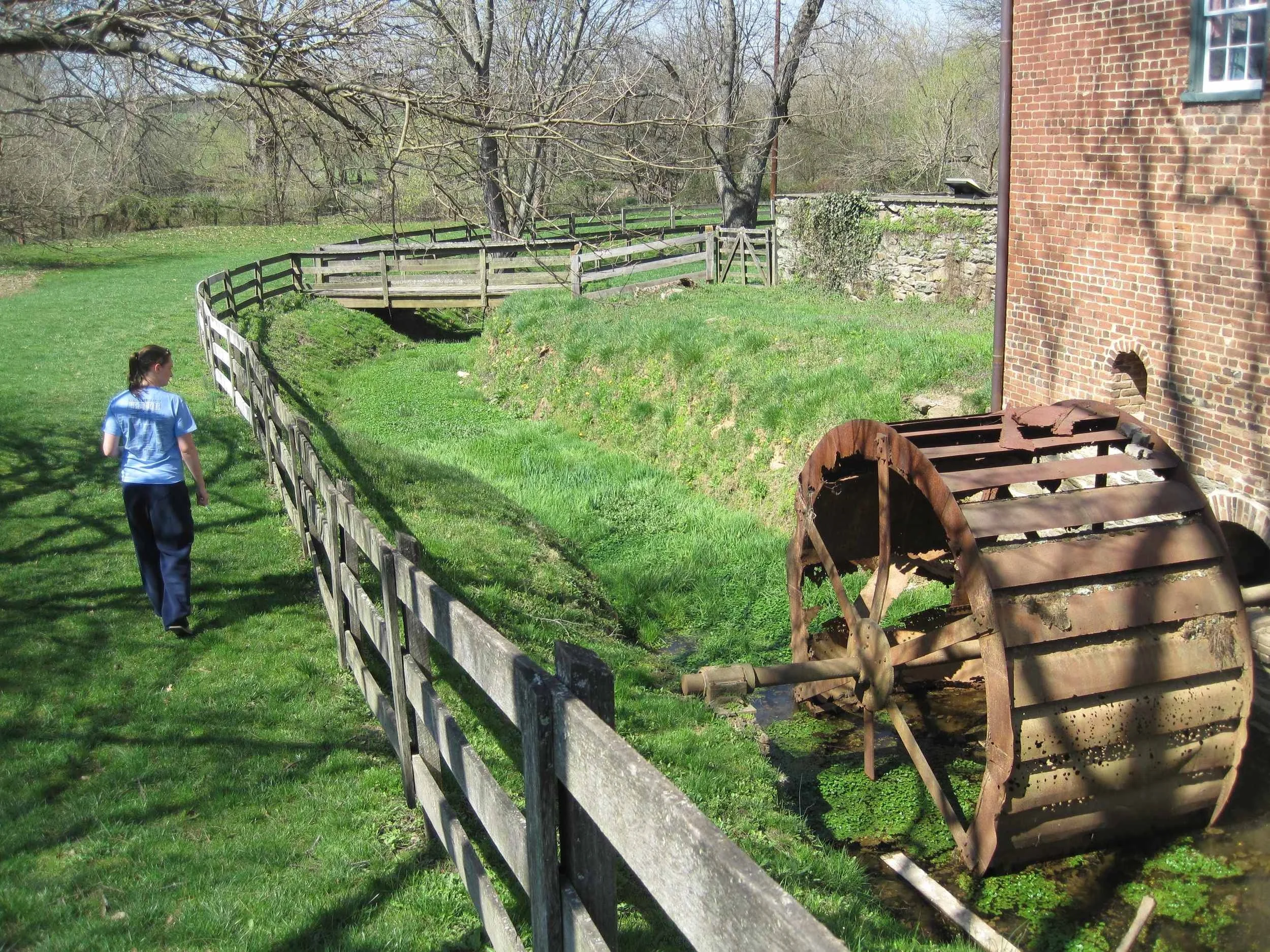 Beth Lewis explores the preserved mill near Catoctin Creek in historic Waterford, Loudoun County.