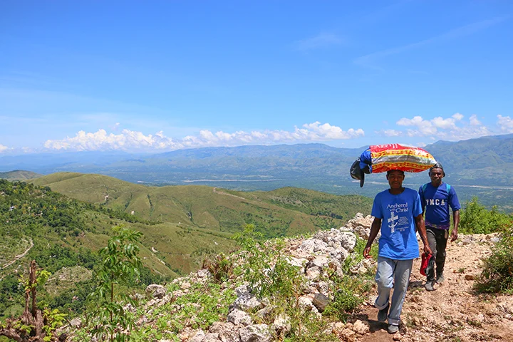 Travel companions crossing the mountains on the way to Leje.