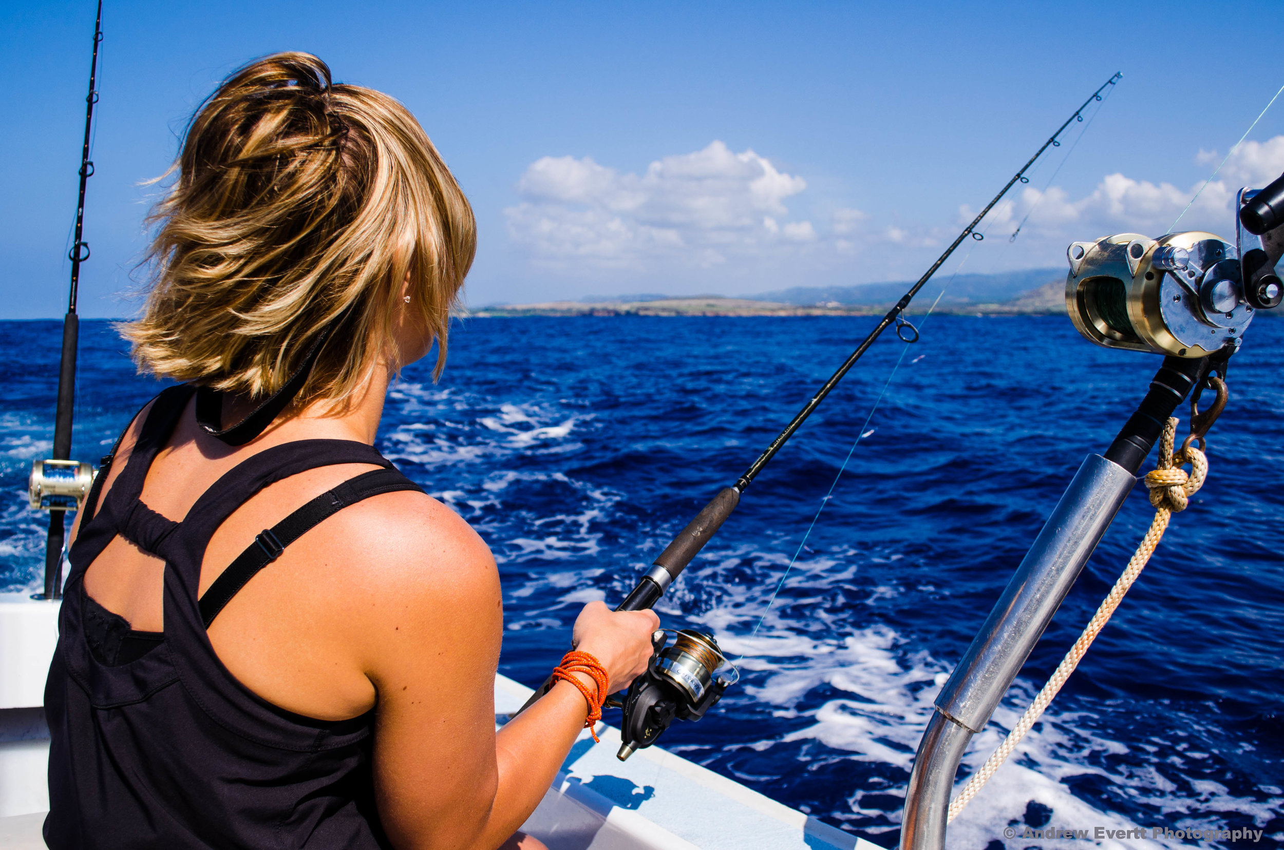 My wife fishing for Yellowfin Tuna with Captain Don's Sportfishing Adventure