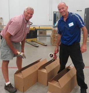 Dan Murray (Golf/Grounds Superintendent) & Nick Kolb (Chief Engineer) were pros with the boxes! Photo courtesy of the Northern IL Food Bank.