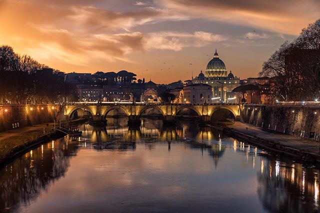 Vatican view, Rome, Italy. This gorgeous view to the Vatican is taken from Ponte Umberto I, is the bridge that links Piazza di Ponte Umberto I to Piazza dei Tribunali. This photo was taken during the sunset. #rome #italy #ponteumberto #tiber #vatican