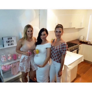 I chose to wear white as it showed my bump off. I got my dress from KOOKAI, it was so comfortable and I felt great in it! (which wasn't very often at that point in my pregnancy).