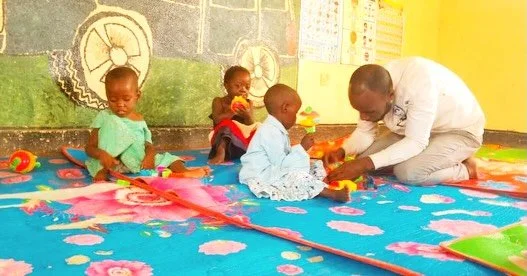 𝗢𝘂𝗿 𝗯𝗿𝗮𝗻𝗱 𝗻𝗲𝘄 𝗽𝗿𝗼𝗷𝗲𝗰𝘁 𝗶𝗻 𝗥𝘄𝗮𝗺𝘄𝗮𝗻𝗷𝗮 𝗥𝗲𝗳𝘂𝗴𝗲𝗲 𝗦𝗲𝘁𝘁𝗹𝗲𝗺𝗲𝗻𝘁, 𝗨𝗴𝗮𝗻𝗱𝗮, 𝗶𝘀 𝗼𝗳𝗳 𝘁𝗼 𝗮 𝗳𝗹𝘆𝗶𝗻𝗴 𝘀𝘁𝗮𝗿𝘁!

Twenty-five previously excluded children are now enjoying play activities three days a we