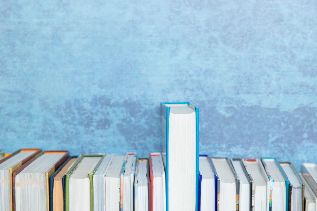 different-size-books-bookshelf-blue-background-education-knowledge-reading-back-school-theme-one-book-stands-out-among-others-growth-confrontation-development-concept_78240-72.jpg