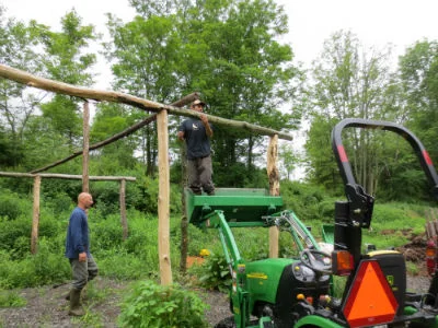 Pole barn construction with black locust logs, no footers or pressure treated wood necessary