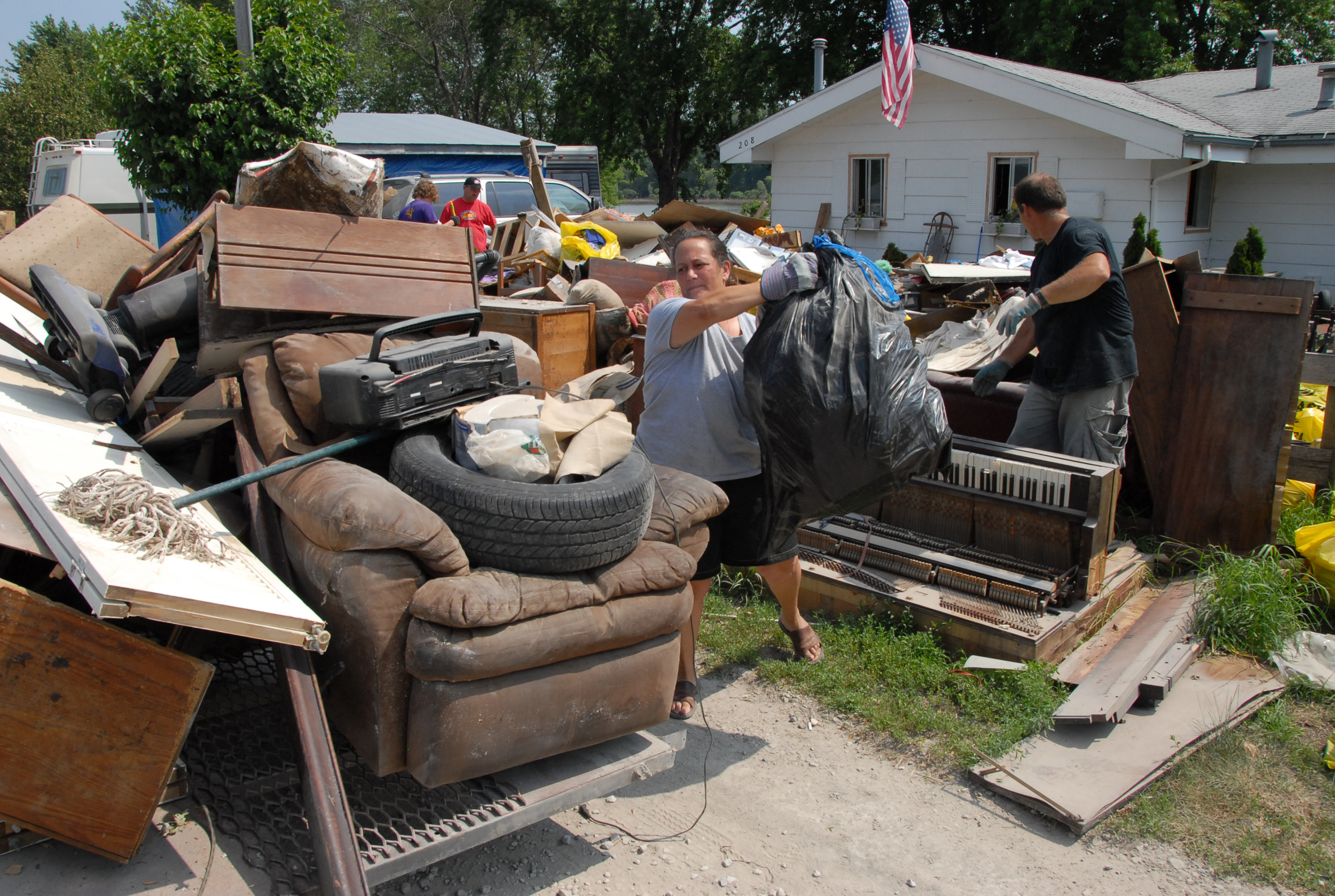 FEMA_-_30609_-_Residents_cleaning_up_after_flood.jpg