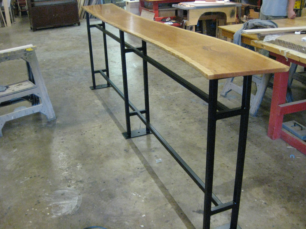 We have literally crafted tons of unique tables and table bases. Here is an example for Starbucks.