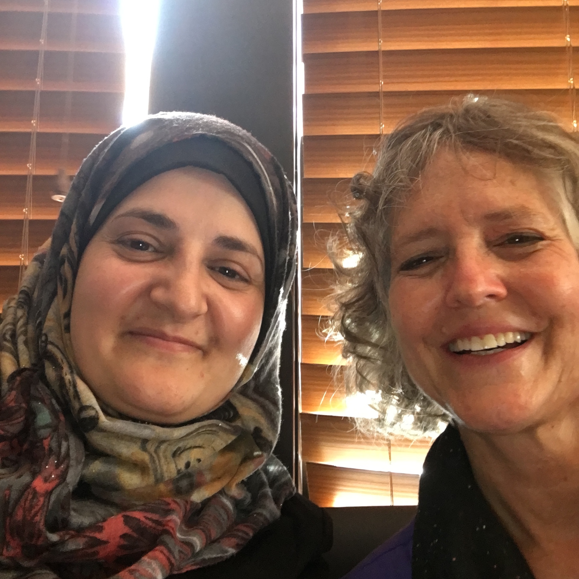 Susan and Ibtehal pose for a selfie.