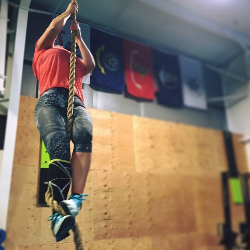 Jill knocking out rope climbs!