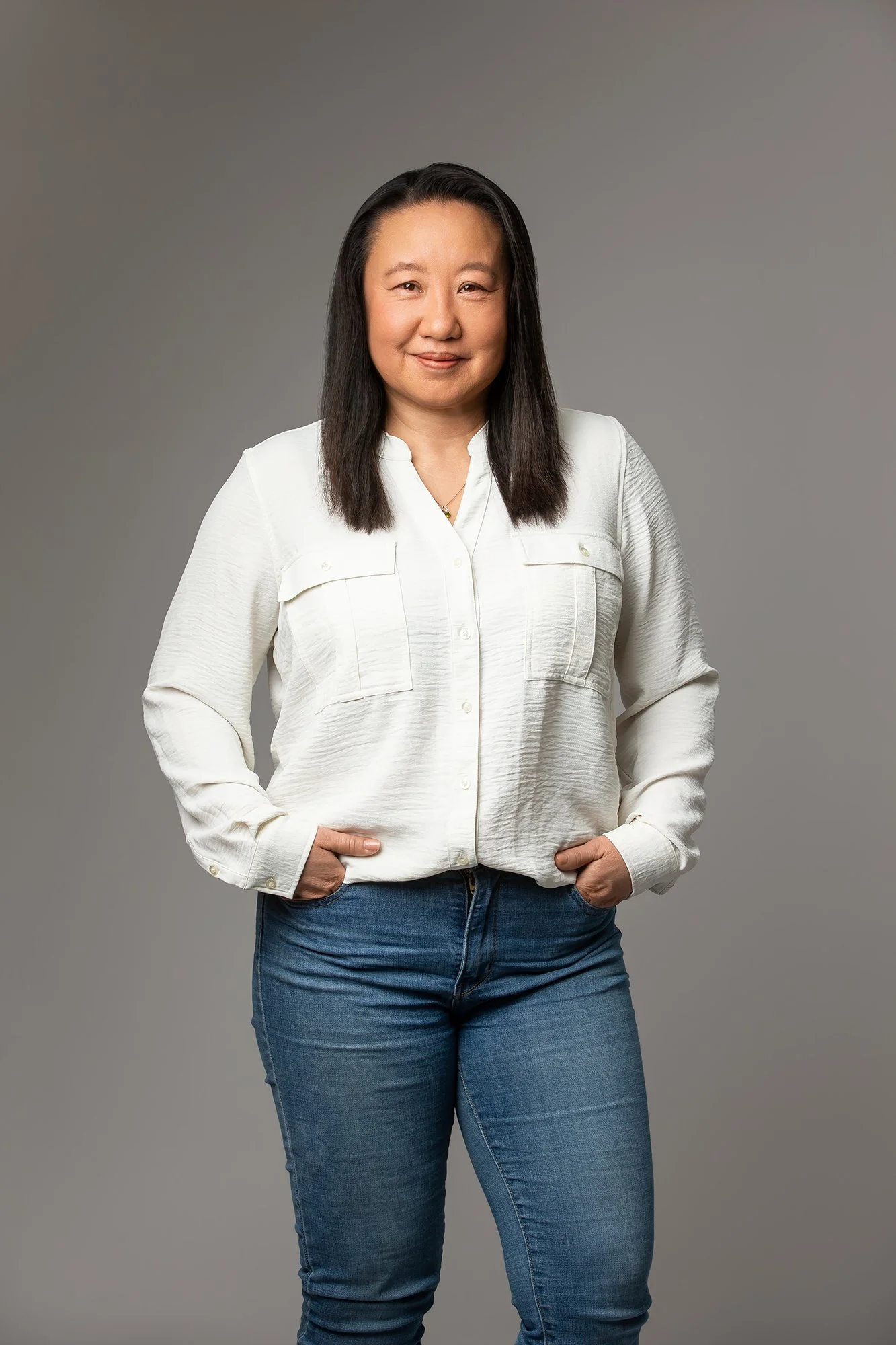 Kathleen Woo Standing 2026_Low res.jpg