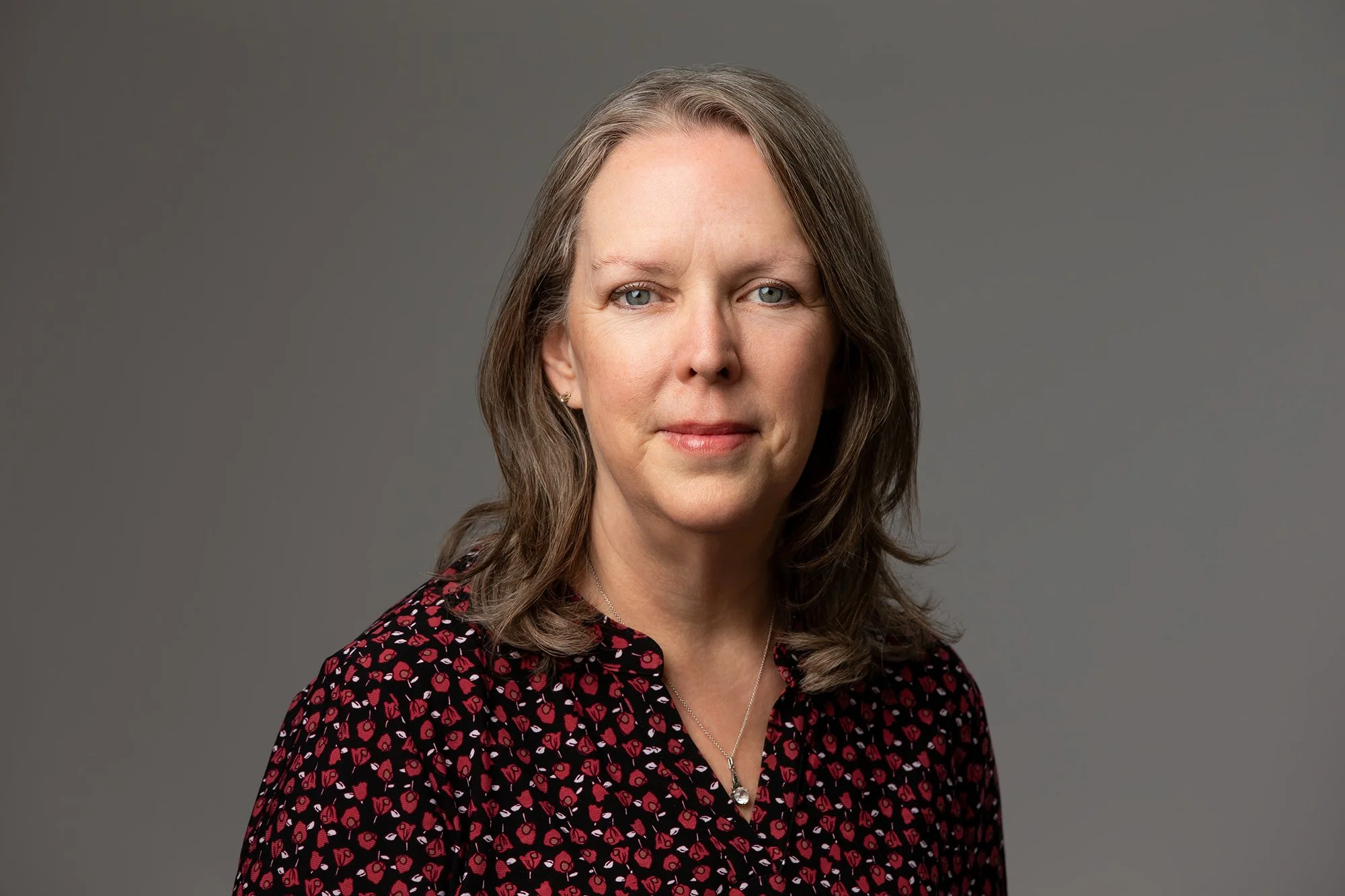 Kelly Morris Headshot 2026_Low res.jpg