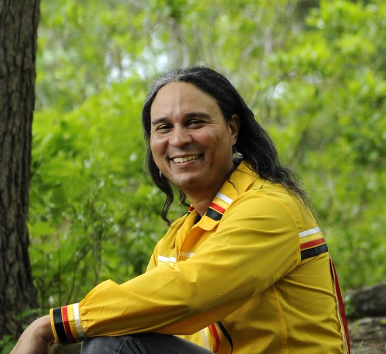Larry Spotted Crow Mann is citizen of theNipmuc Tribe of Massachusetts. He is an award winning writer, poet, cultural educator, Traditional Story Teller, tribal drummer /dancer and motivational speaker involving youth sobriety, cultural and environmental awareness. He travels throughout the United States, Canada and parts of Europe to schools, colleges, pow wows and other organizations sharing the music, culture and history of Nipmuc people. He has also given lectures at universities throughout New England on issues ranging from Native American Sovereignty to Identity. In 2010 his poetry was a winner in the Memscapes Journal of Fine Arts . 2013his poetry was nominated for the Pushcart Prize. Mann's first book, Tales From the Whispering Basket, is internationally acclaimed and has received excellent reviews. Mann’s new book, The Mourning Road to Thanksgiving has been a number one selling novel out of Word Branch Publishing and is the 2015 winner of the WordCraft Circle of Native American Writers Young Adult Novel. Scholars, students and everyday readers are calling it one of the most powerful and memorable books they have ever read. Larry Spotted Crow Mann was applauded for his role in the PBS Native American film We shall Remain , directed by Chris Eyre. Also featured in two documentaries- Winner of the NPS 2007 Award for Interpretive Media: Living in Two Worlds , Native American Experiences on the Boston Harbor Islands, And First Patriots, produced by Aaron Cadieux. Furthermore he has worked in the field of human services for over 10 years, mostly in the field of mental health and helping at risk youth. Protecting the environment : Worked with Tribal, federal and state agencies to preserve land and wildlife: notably Atlantic Salmon * Publishing’s include the Memescapes Journal of Fine Arts at Quinsigamond College . * Indian Country Today Magazine * Contributing work in the book by Margaret Barton, New England on Fire , and * Dawn Land Voices : Native American Anthology of New England : University of Nebraska Press His poetry and quotes have been included in: * Go Green Conference for the Medical Services Administration of Puerto Rico * WordCraft Circle of Native American Writers * My Heart Is Red Project: A journey across the United States and Canada of photography and video of Native Americans, by Mayoke photography. Also Mann’s books, Tales from the Whispering Basket; a compelling collection of short stories and poetry~ The Mourning Road to Thanksgiving , A Powerful Novel that takes us beyond what we think we know about Thanksgiving, America and ourselves. For more info go to: www.whisperingbasket.com Click on Events / Press Kit for more details about past work and references. Larry 