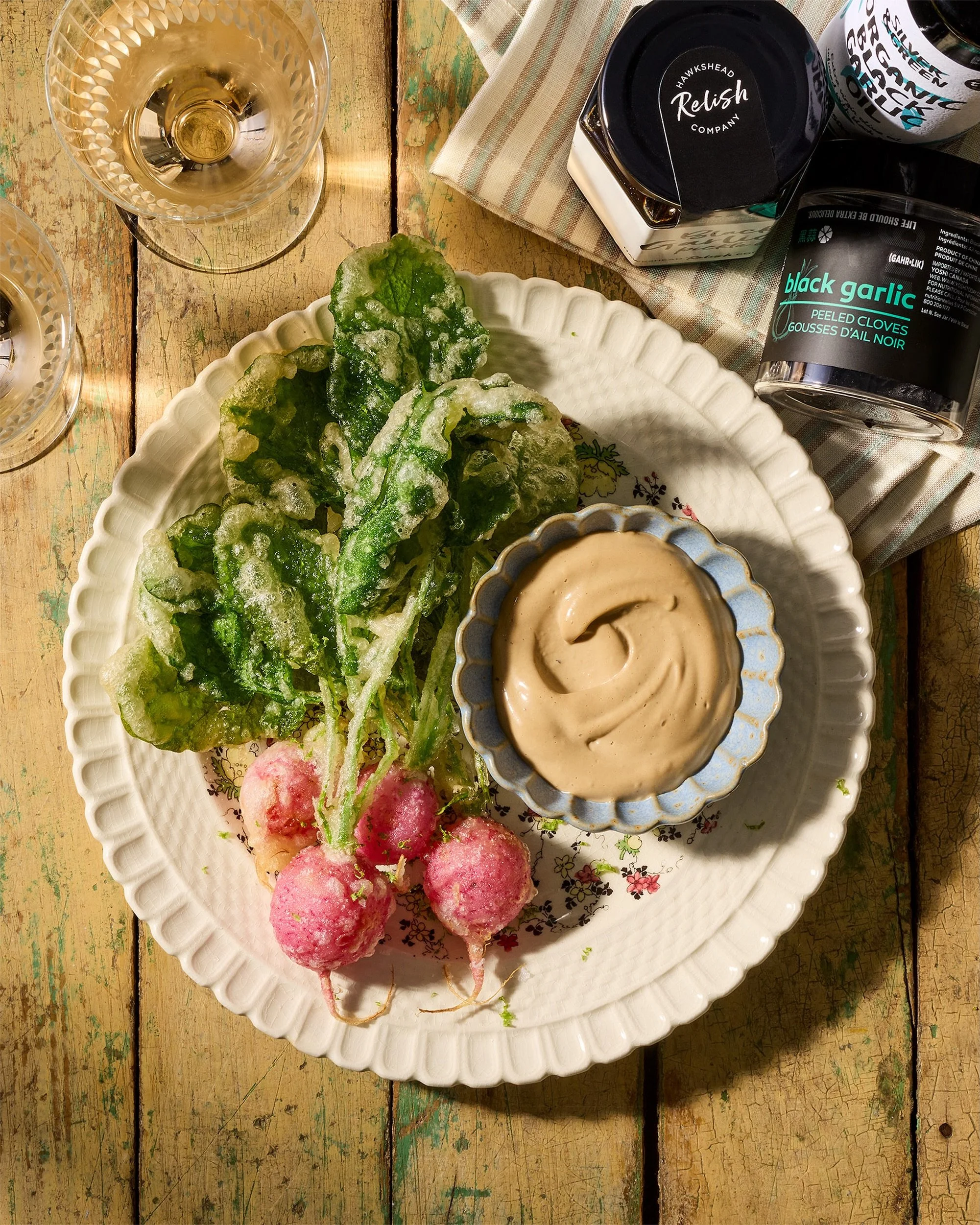 Black garlic starts as regular garlic, then slowly cures under low heat until all the sharpness disappears and something molasses-sweet and savoury takes its place. A powerhouse of flavour, and good for you too.
This radish tempura with black garlic 