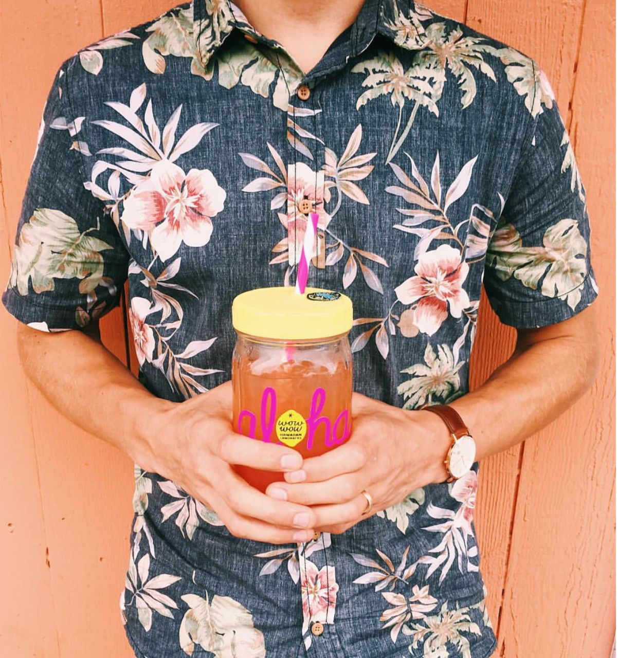 Go tropical with this button-up…and a drink in hand.