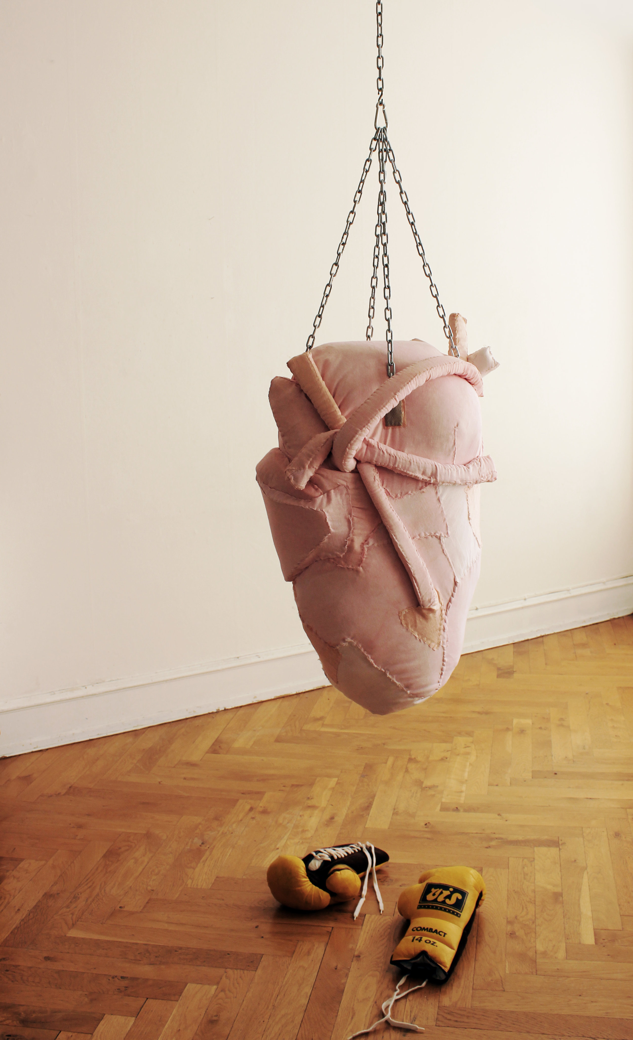  Anatomical heart punchbag. 2017  Textile,embroidery,iron chain,boxing gloves.  70x40x50cm 