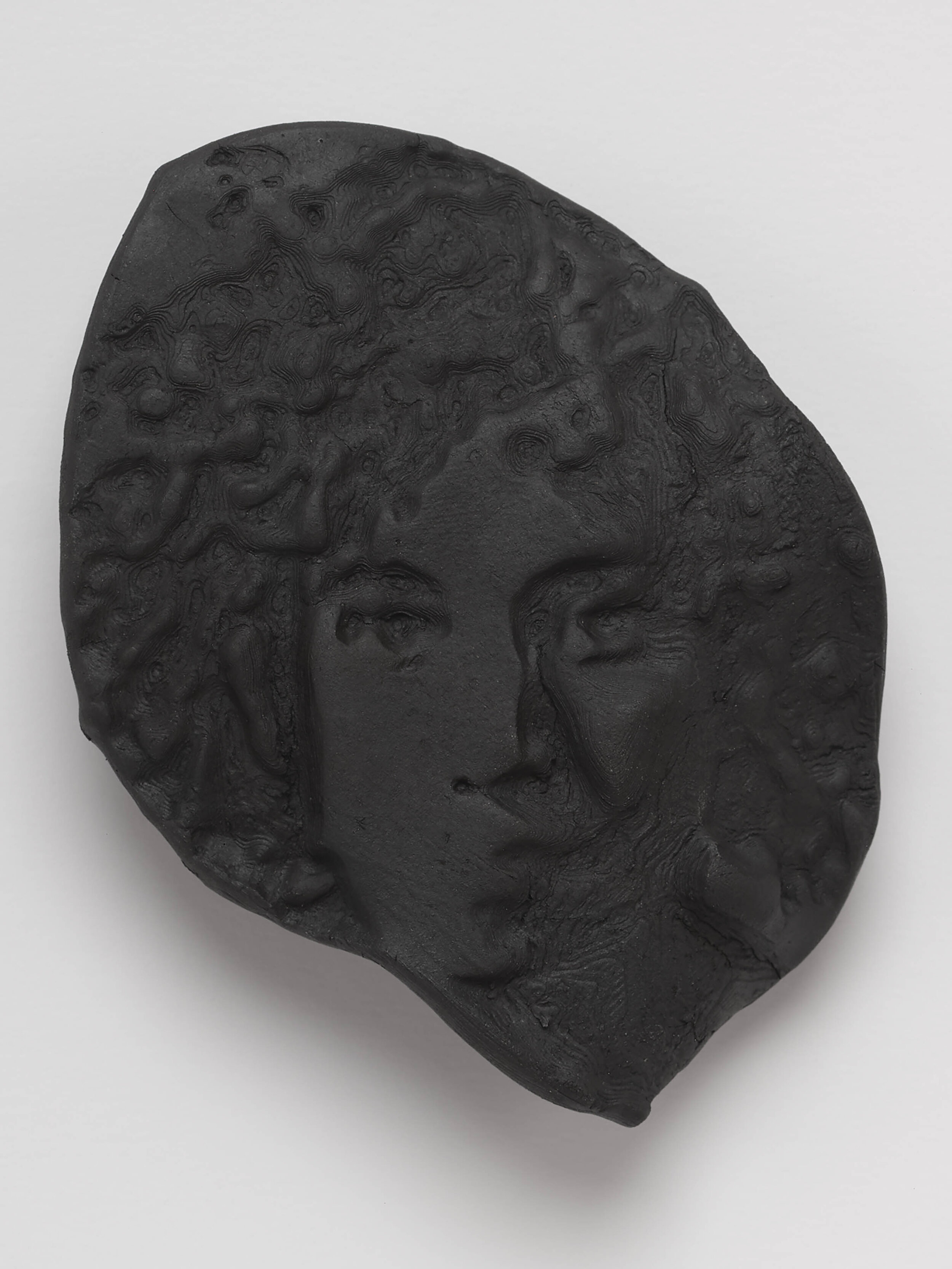  Untitled 01 (Self Portrait), 2020.  Cassius Obsidian clay, unique in a series.  4 ½ inches x 3 ¾ inches.  Edition of 3.  