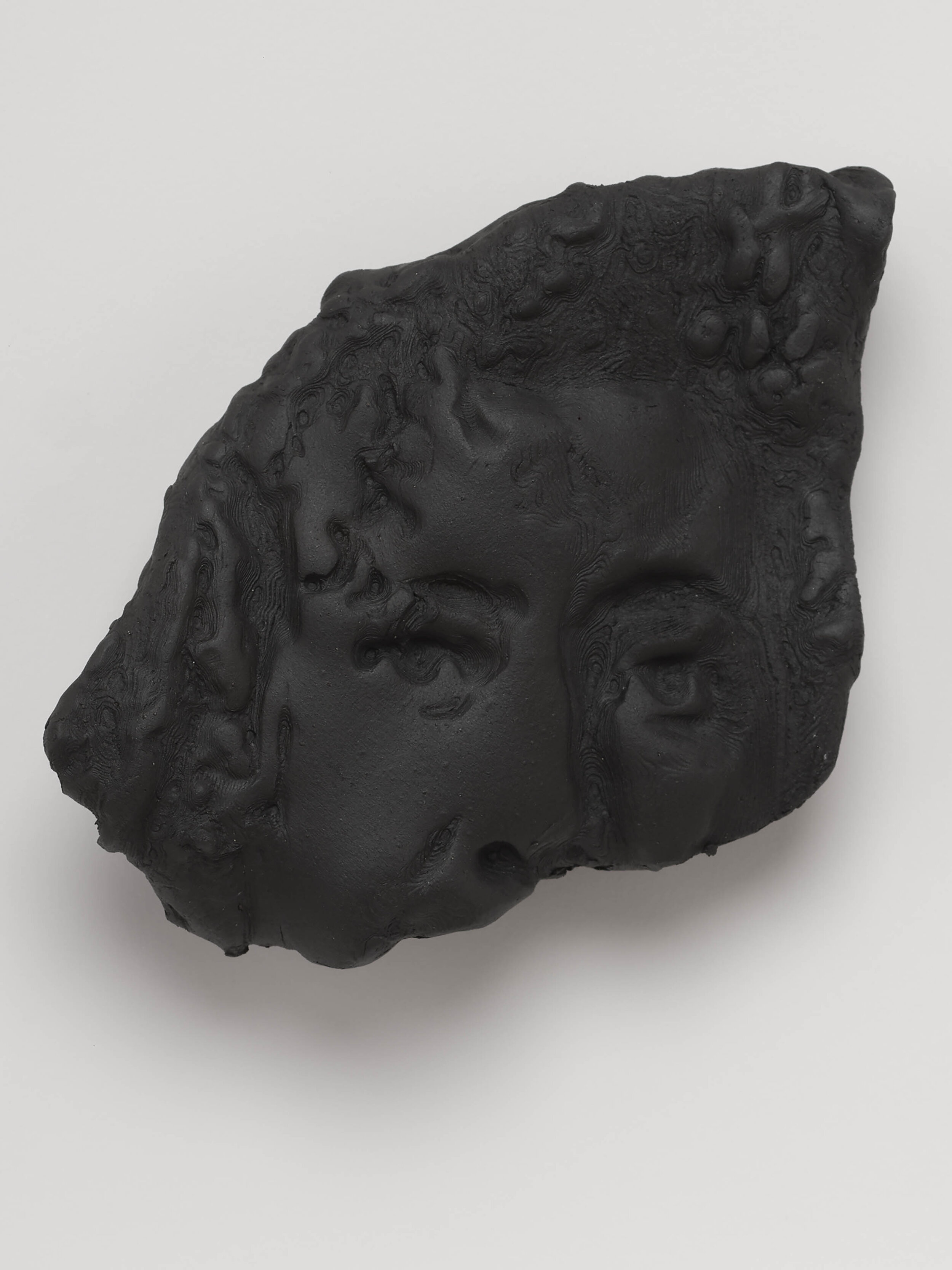  Untitled 05 (Self Portrait), 2020. Cassius Obsidian clay, unique in a series.   4 ½  x 3 ¾  inches.  Edition of 3.    