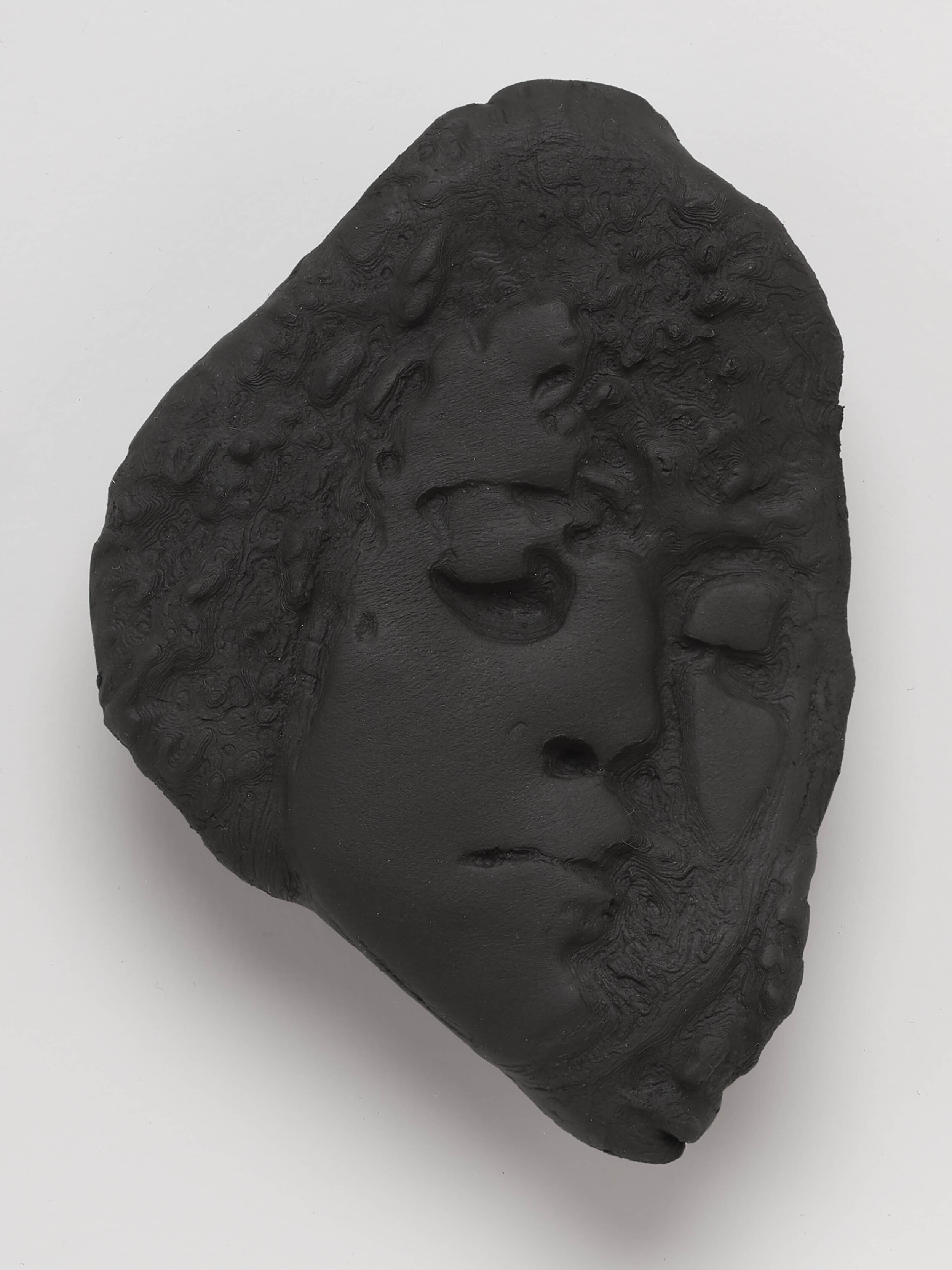  Untitled 04 (Self Portrait), 2020. Cassius Obsidian clay, unique in a series.   4 ½  x 3 ¼  inches. Edition of 3. 