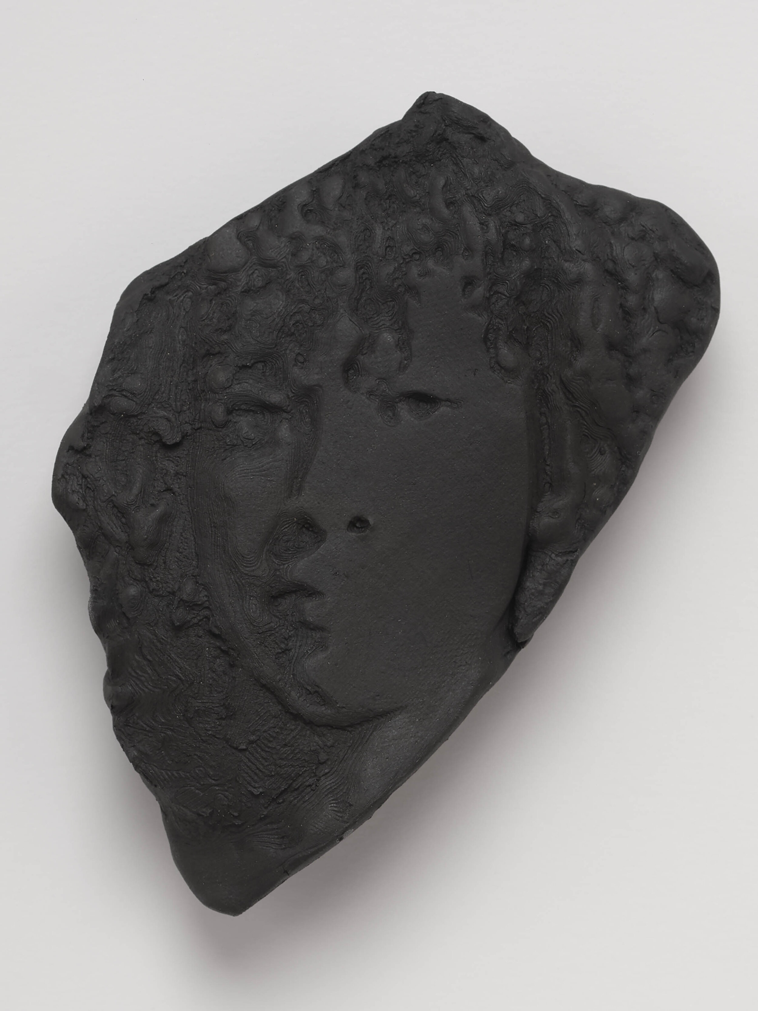  Untitled 02 (Self Portrait), 2020. Cassius Obsidian clay, unique in a series.   4 ½  x 3 ¾  inches.  Edition of 3.  