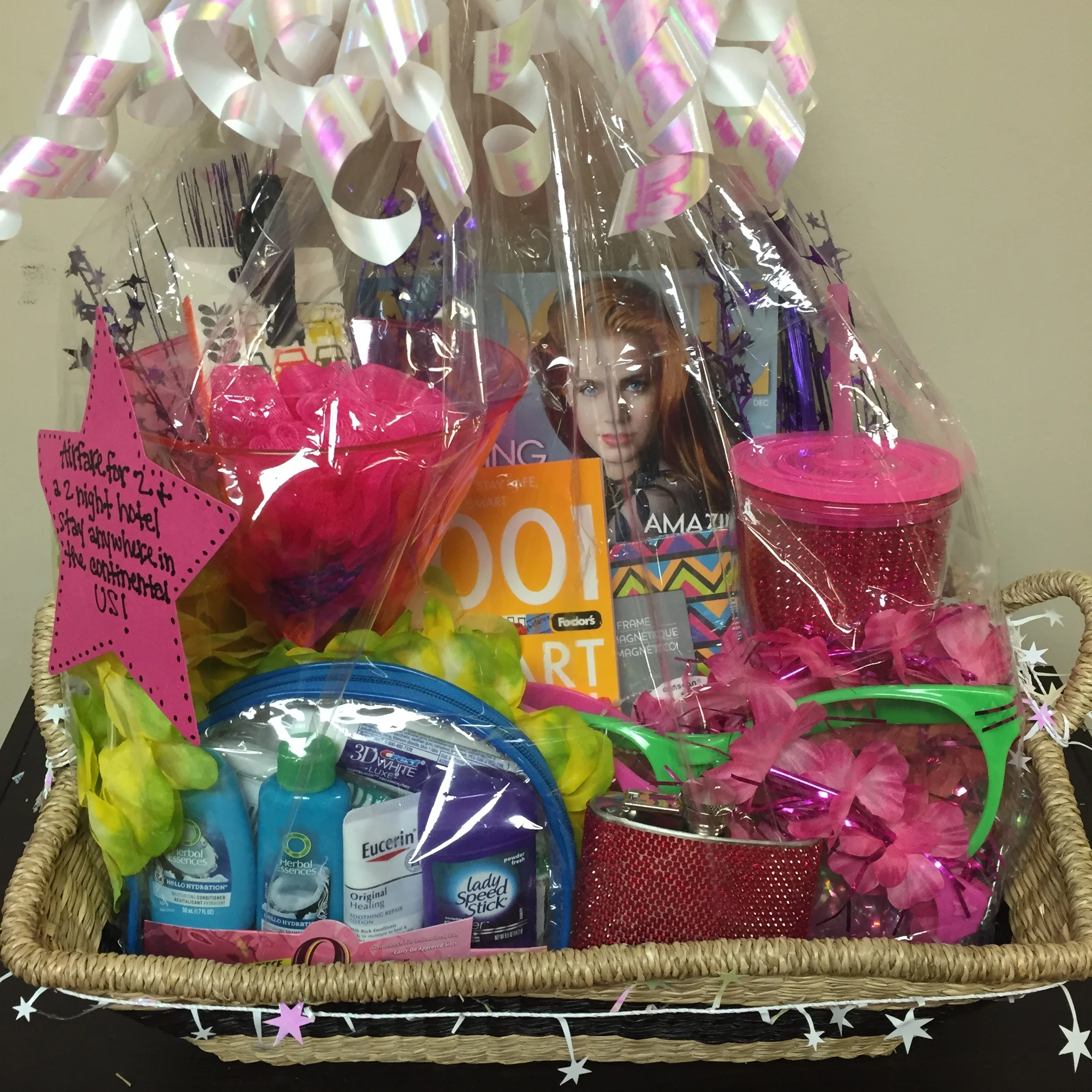  A couple examples of the gift baskets I make at work for our sales team when they hit a million dollars in sales for the year and receive a weekend trip. 