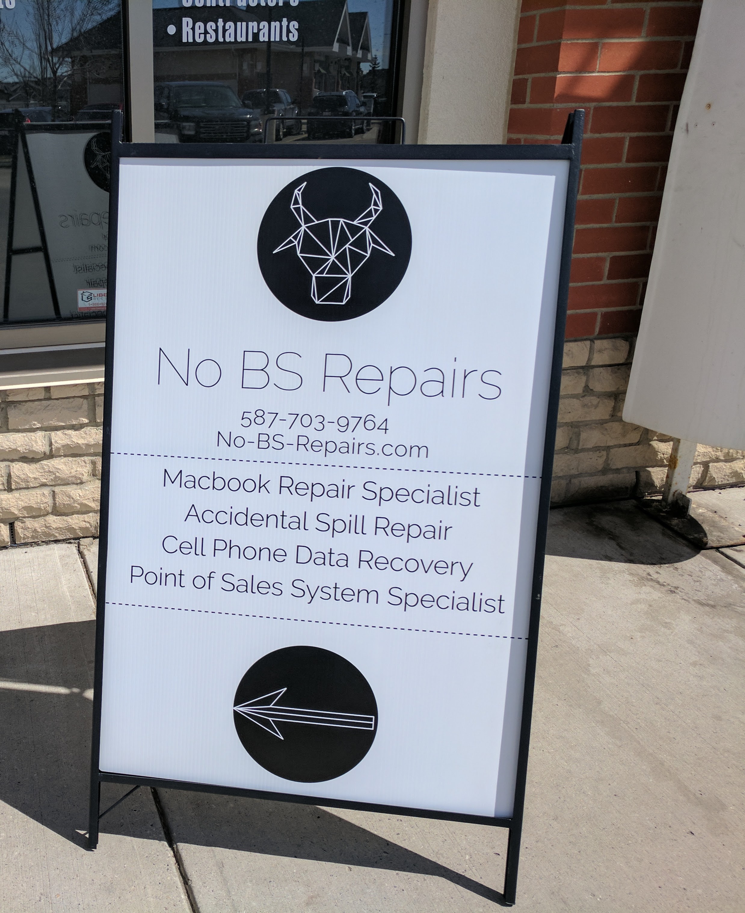 (The sign you will see from outside the building)