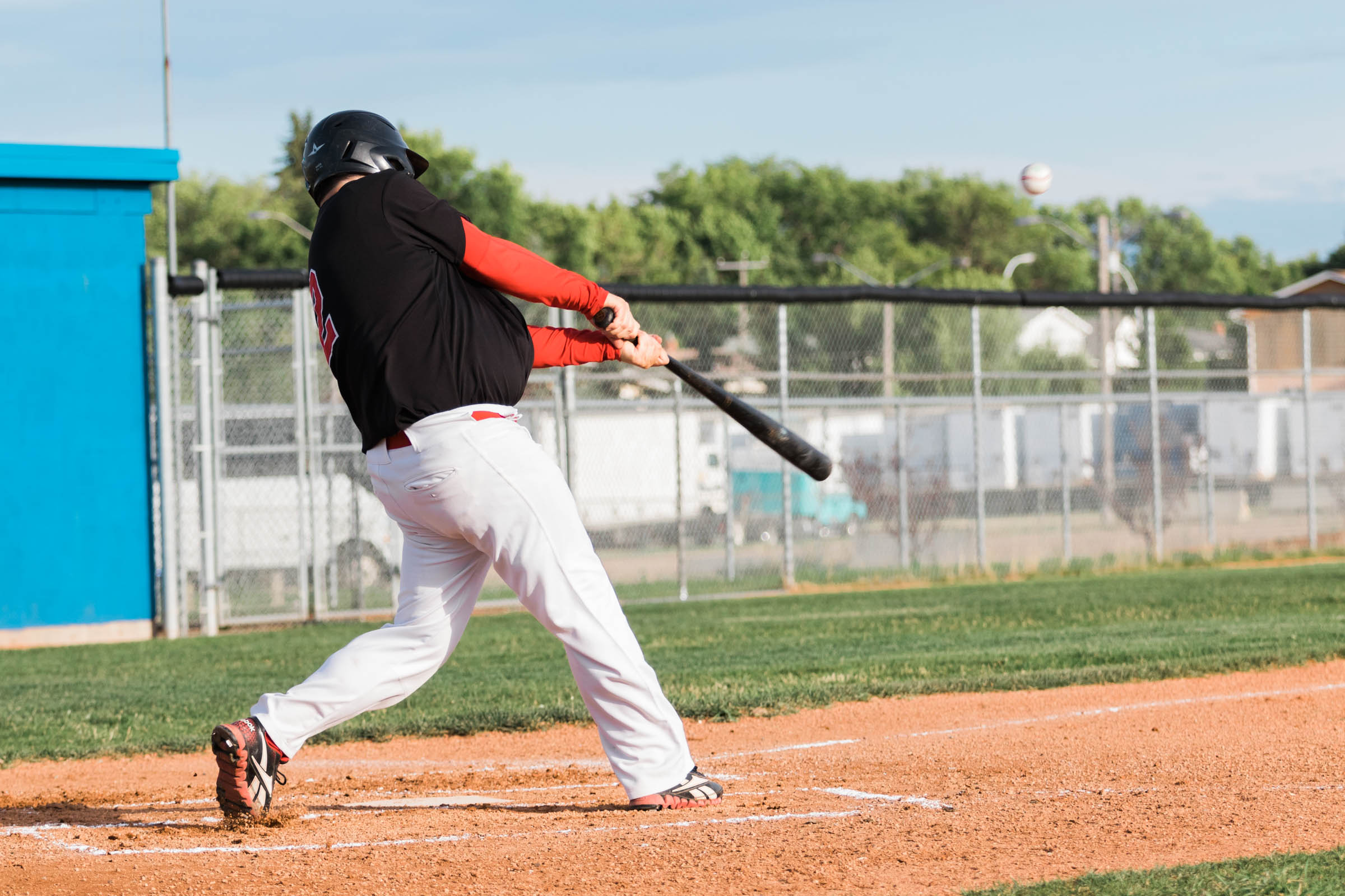 Bryan Toles of the Camrose Axemen hits a single (a career defining Texas Leaguer) against the Sherwood Park Athletics in what very well could be the last at bat of his career (2004-2016). The longtime player/coach of the Axemen has been contemplating retirement | July 20 at Footz Field, Edmonton