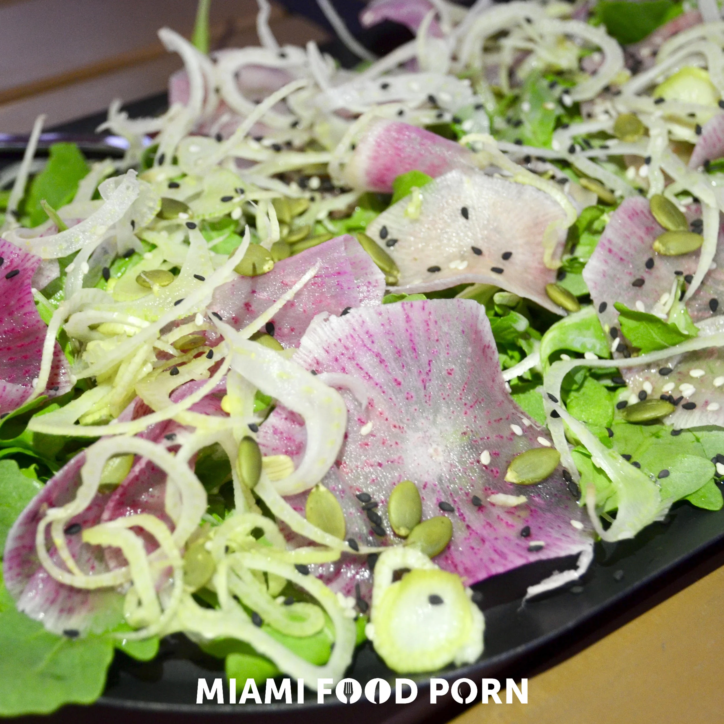 ORGANIC ARUGULA SALAD with Fennel, Watermelon Radish, Seeds, Champagne Vinaigrette