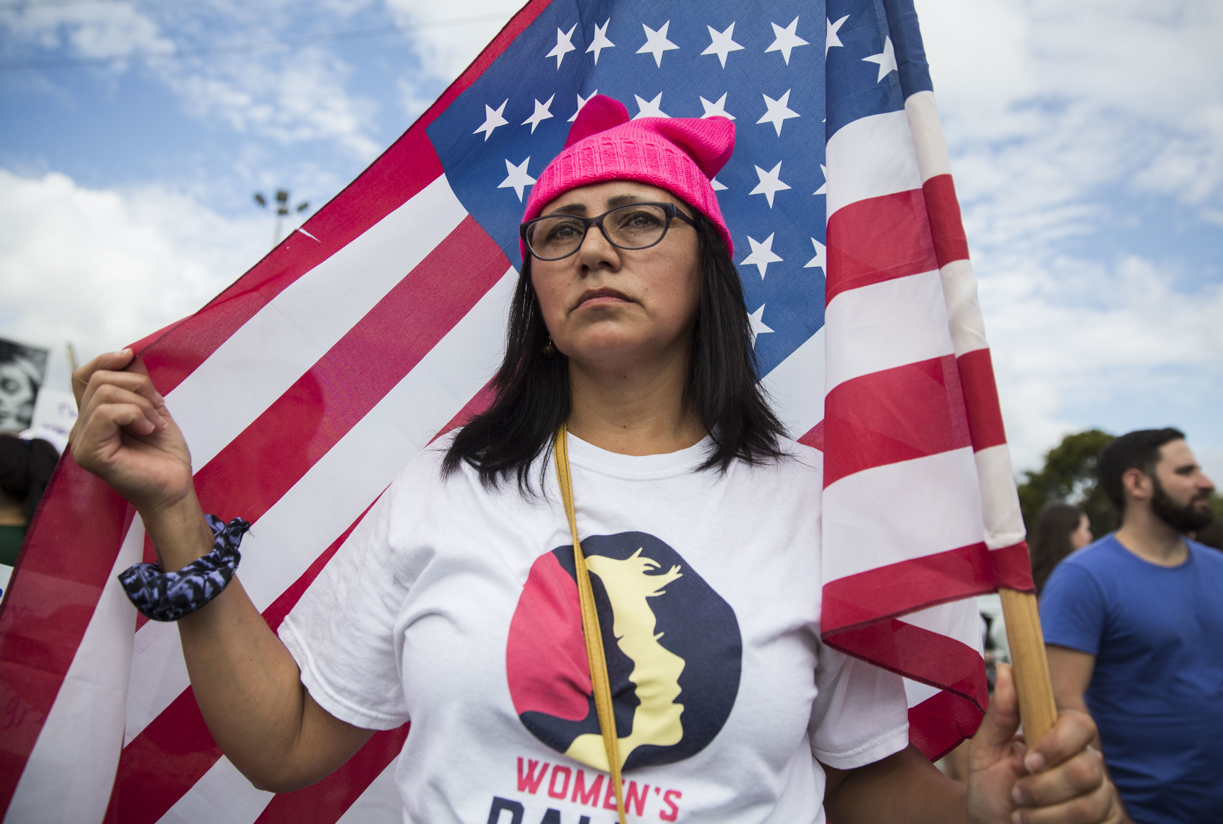  Vivian Ivalo, 50, who is originally from Argentina but now lives in Miami stands with an American flag during the Women's March Florida at Mana Wynwood in Miami on Jan. 21, 2018. "I attended this because I feel empowered by the people around me," sa