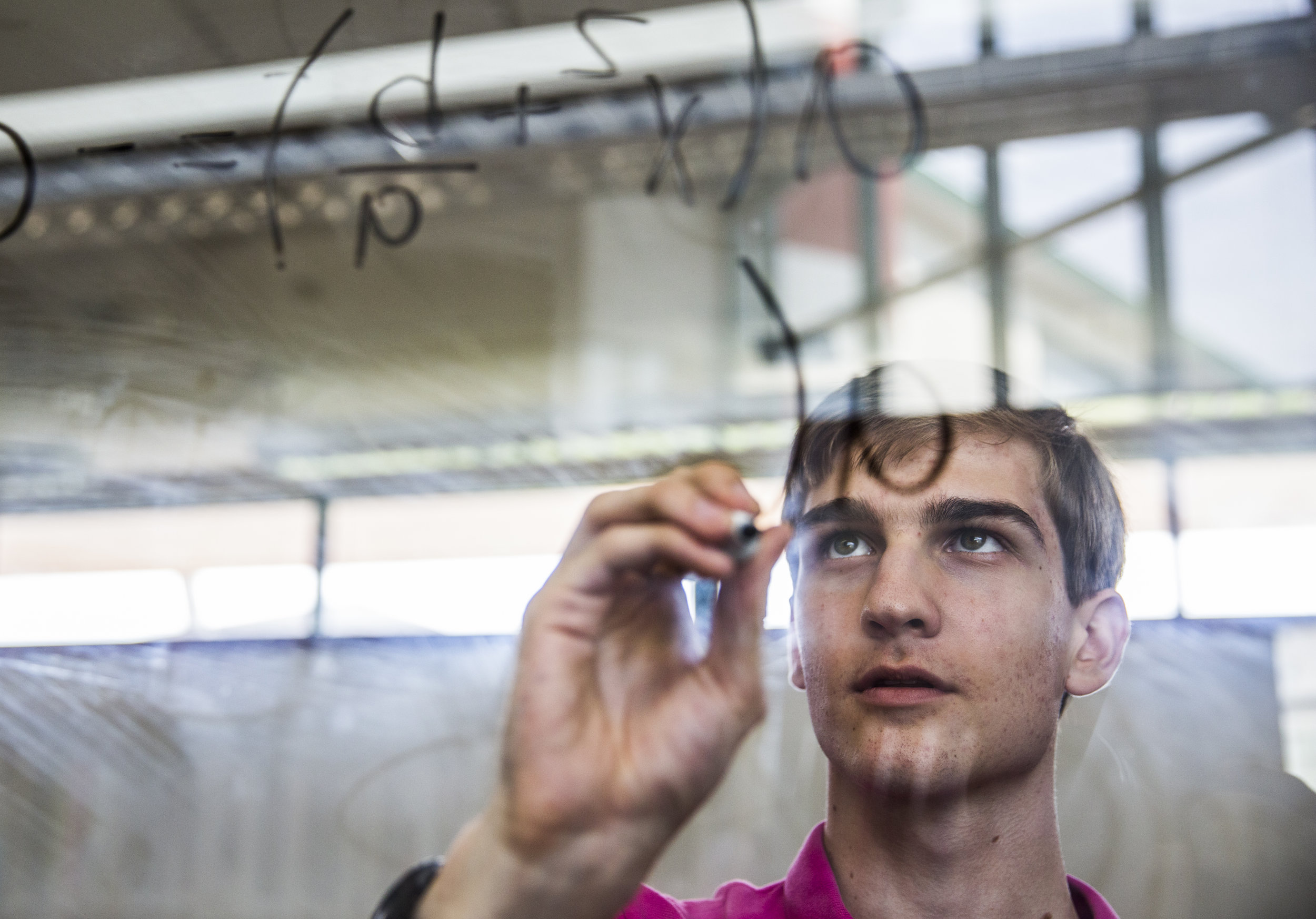  Jack Ciabaton works out a mathematics equation at the Community School of Naples in Florida on May 10, 2018. Ciabaton will be attending Brown University in the fall and plans on pursuing a degree in mathematics. 