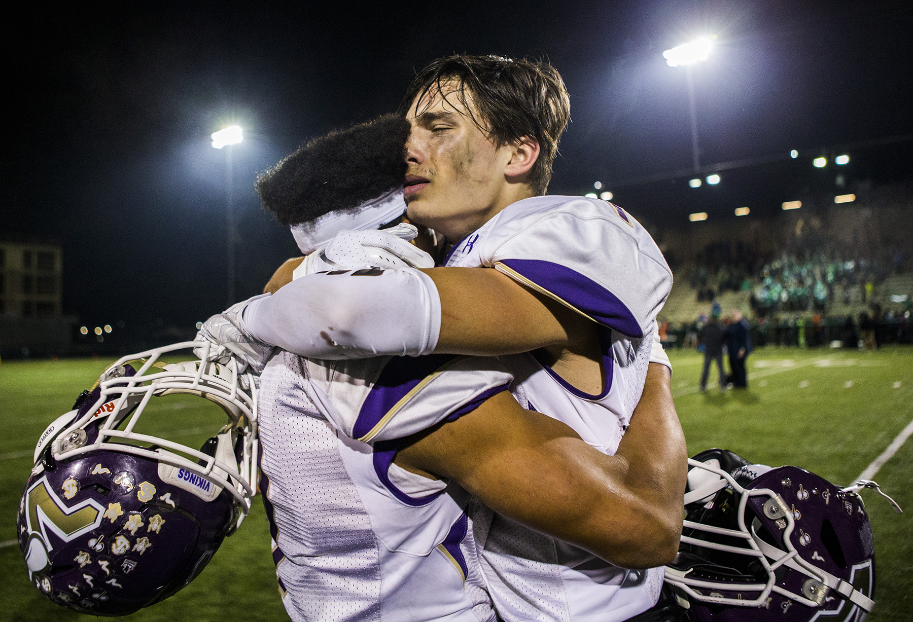  Lake Stevens’ Ian Hanson hugs teammate Isaiah Harris while he cries after winning the Class 4A state semifinal game against Woodinville at Pop Keeney Stadium on Saturday, Nov. 24, 2018 in Bothell, Washington. 