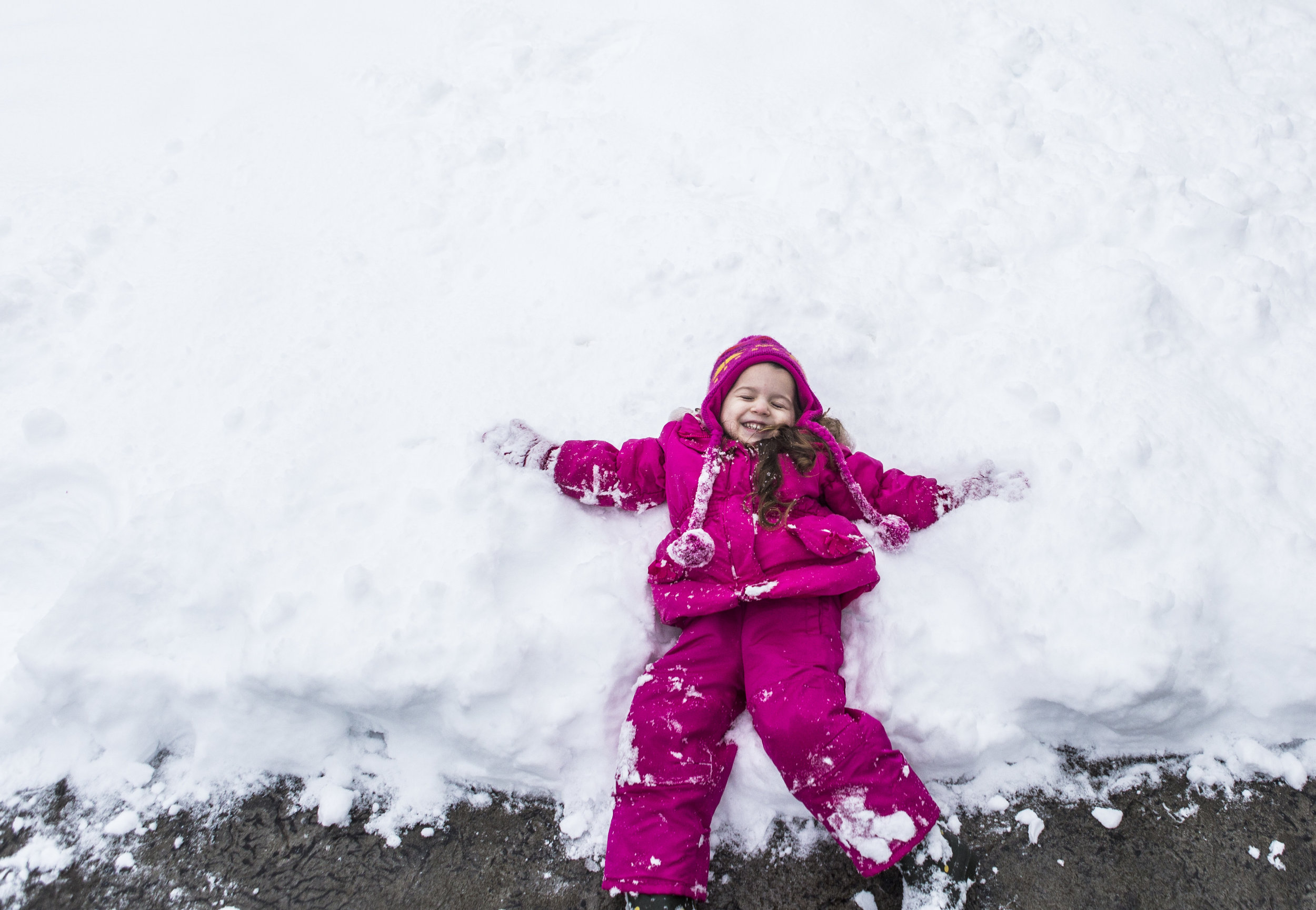  Kaylee Williams, 3, smiles as she makes her first snow angel of the day in the front yard of her family's home on Saturday, Feb. 9, 2019 in Everett, Wa. The Puget Sound area was hit by a massive snowstorm for the second time in two weeks resulting i