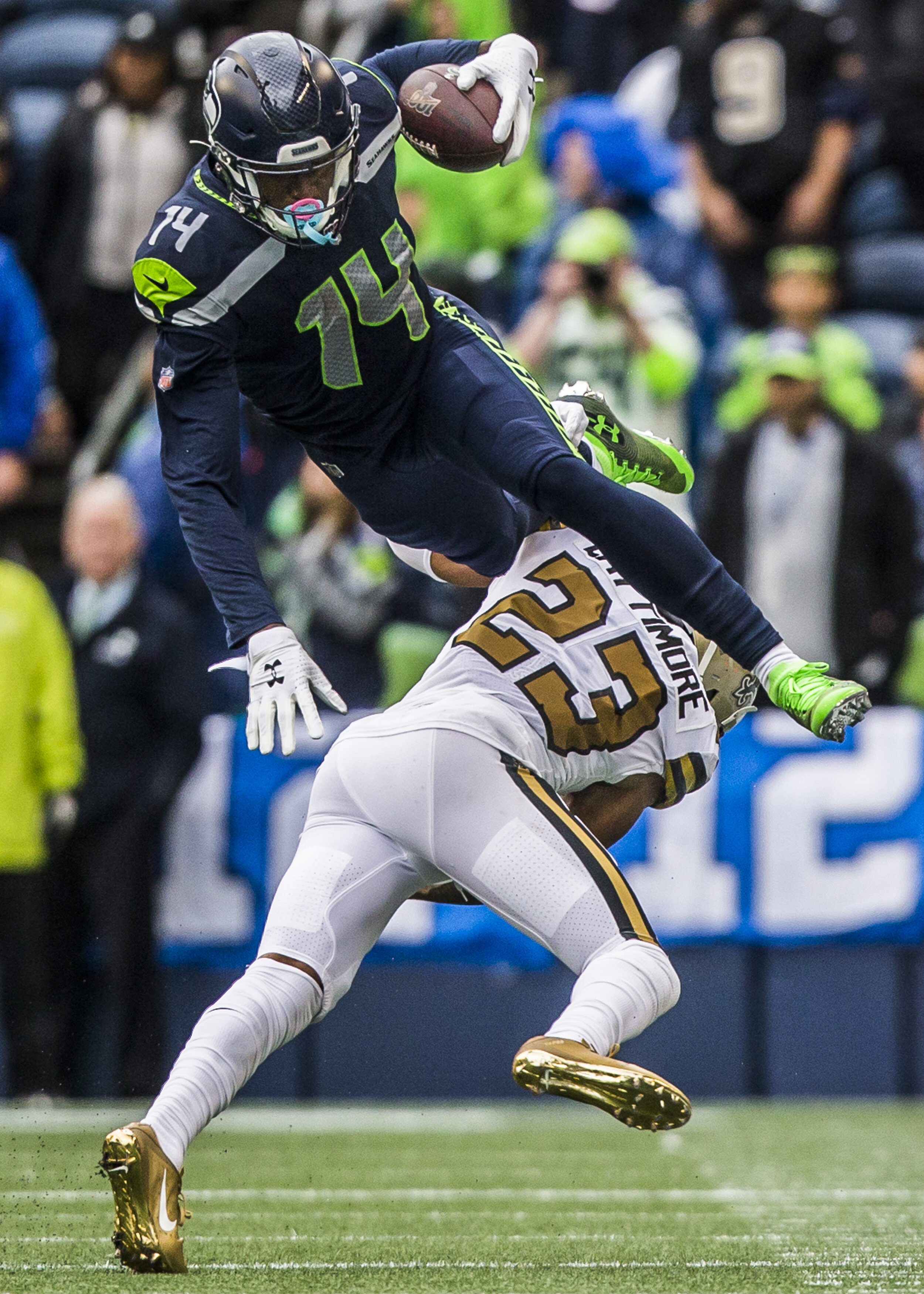  Seattle Seahawks’ DK Metcalf jumps over New Orleans’ Marshon Lattimore  during the game against the New Orleans Saints at on Sept. 22, 2019. 
