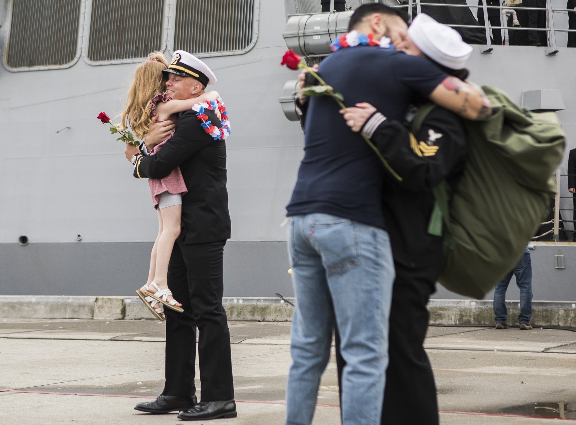  Shane Freeman, left, hugs his daughter Elizabeth Freeman, 5, after returning from a 4-month deployment aboard the USS Kidd on Friday, Sept. 24, 2021 in Everett, Washington. 