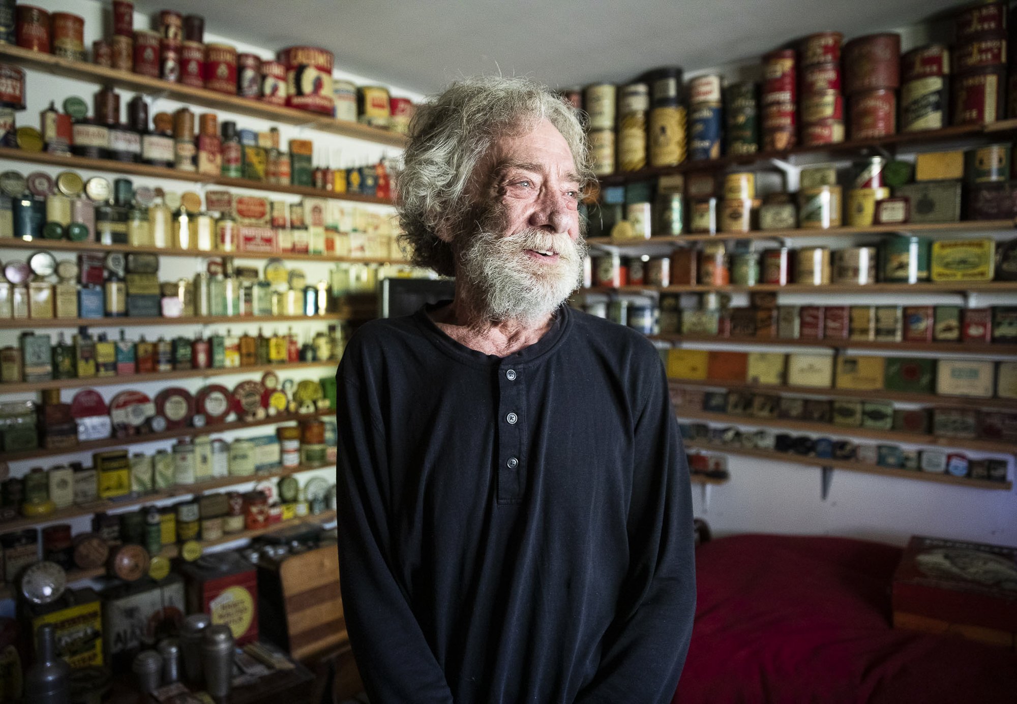  Daniel Weiss, 73, inside his “tin room” at his home that holds the majority of his expansive tin collection on Oct. 12, 2023 in Mountlake Terrace, Washington. Weiss is trying to find new homes for the assorted 1,400 vintage tins he has collected ove