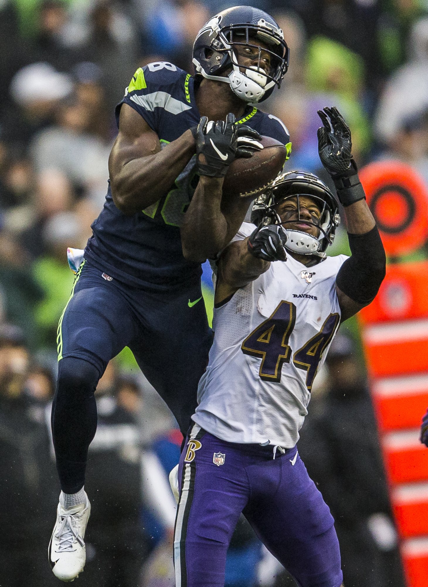  Seattle Seahawks' Jaron Brown jumps above Baltimore Ravens’ Marlon Humphrey to make a catch during the game against the Baltimore Ravens on Oct. 20, 2019 in Seattle, Washington. 