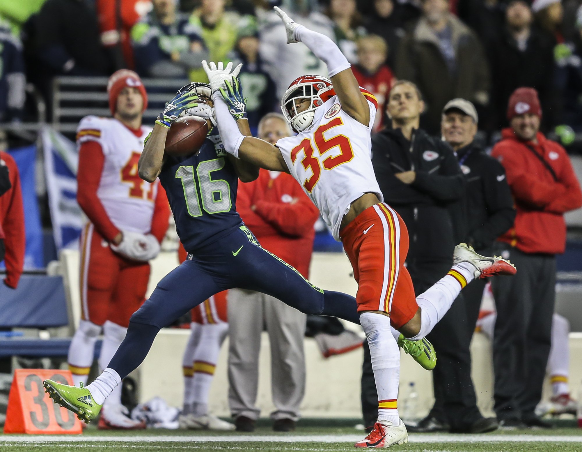 Seattle Seahawks Tyler Lockett makes a catch while being guarded by Kansas City Chiefs’ Charvarius Ward during the game on Dec. 23, 2018.