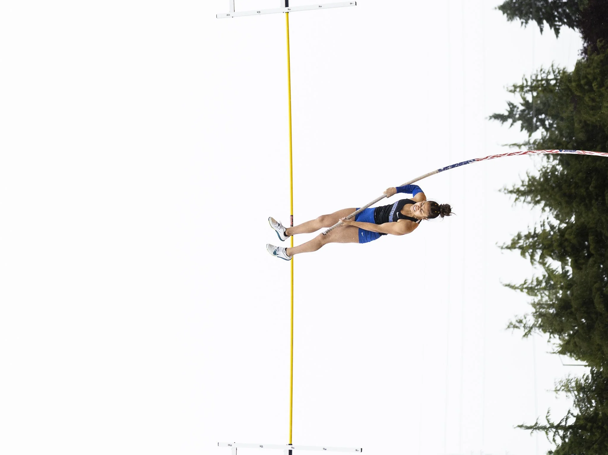  Shorewood’s Ava Enriquez maneuvers over the bar in the 3A girls pole vault final on Saturday, May 31, 2025 in Tacoma, Washington. Enriquez went on to be the sole athlete to clear 12-00. Competing against no one but herself, she cleared 12-06 on her 