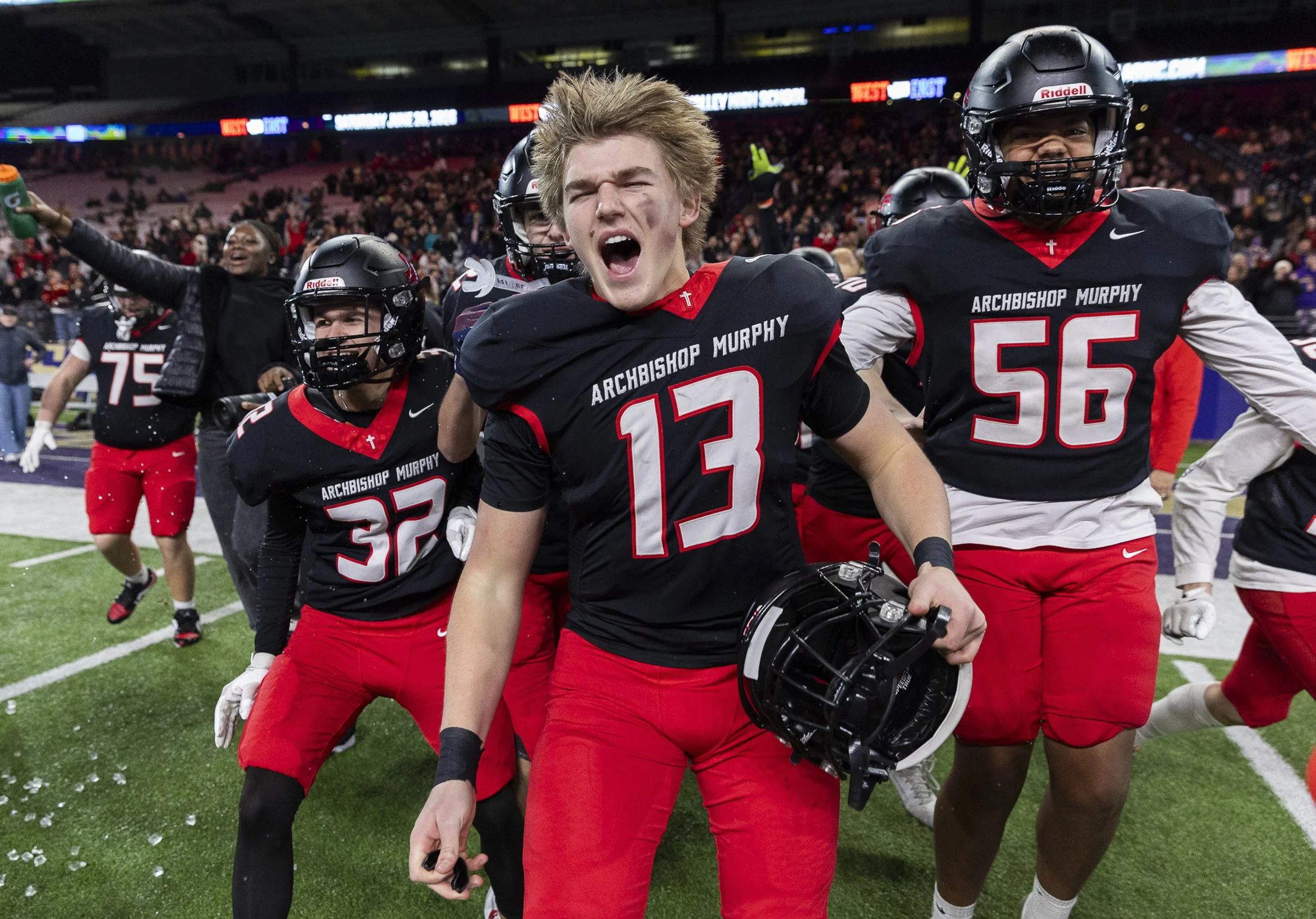  Archbishop Murphy’s EJ Manning yells after winning the 2A state championship game against Tumwater at Husky Stadium on Saturday, Dec. 6, 2025 in Seattle, Washington. Archbishop Murphy, just three seasons removed from an 0-8 campaign, raised the stat