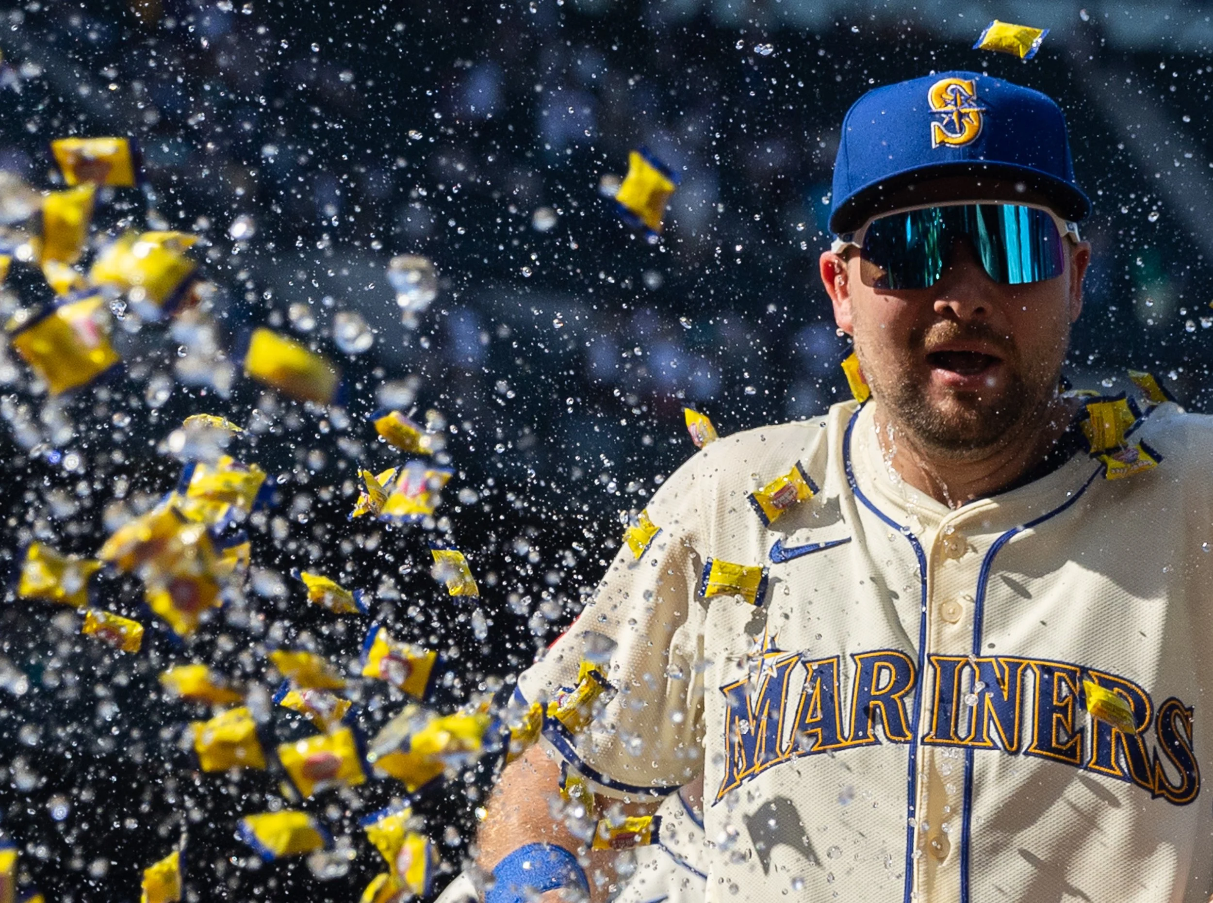  Cal Raleigh #29 of the Seattle Mariners reacts to having gum and ice thrown on him after the game against the Athletics at T-Mobile Park where Raleigh hit his 49th home run to break the MLB single-season home run record for catchers on August 24, 20