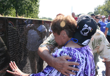 Ron's grandparents at the moment they saw their son's name on The Wall for the first time.