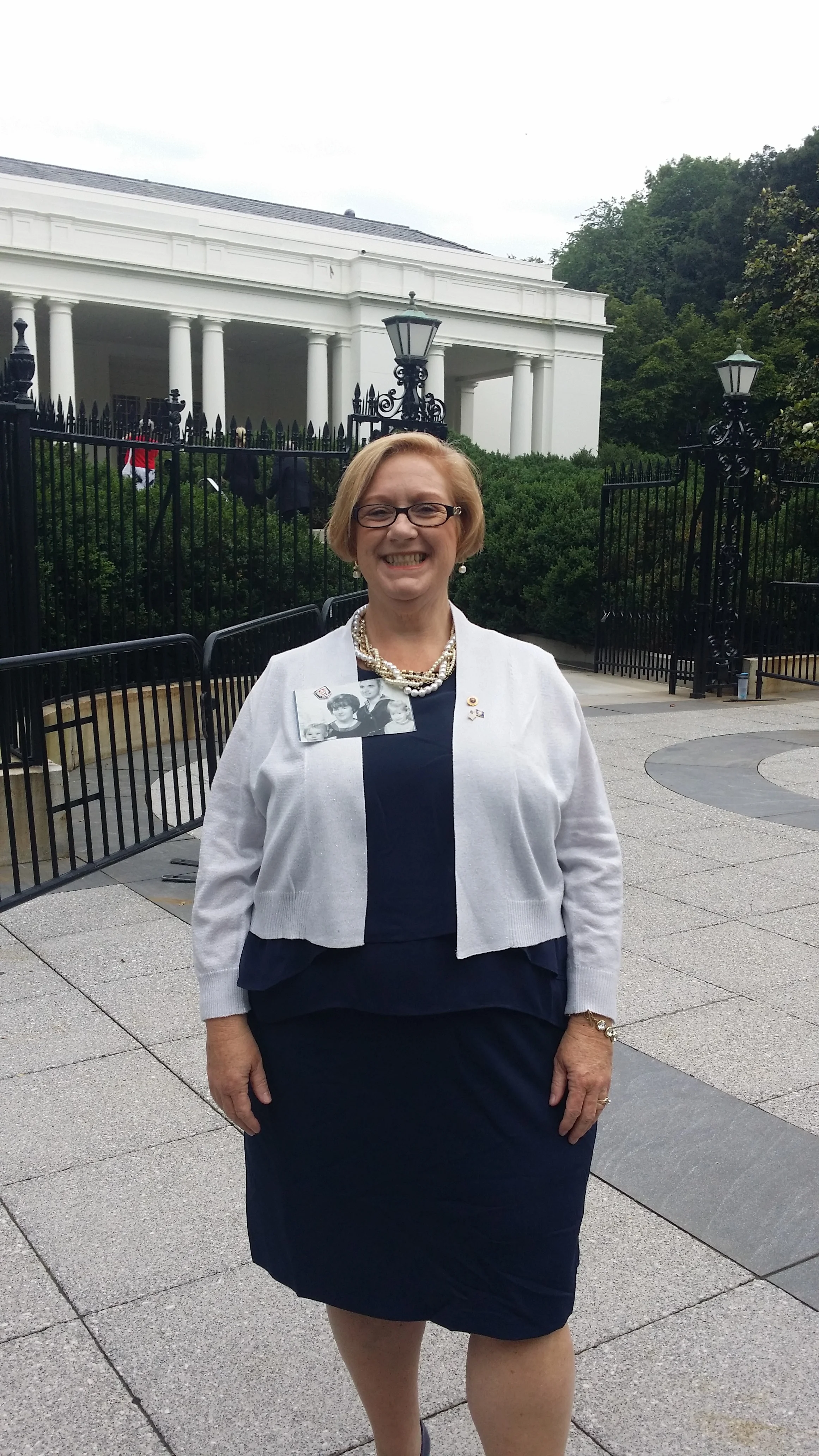 Susan outside the private guest entrance to The White House. Photo courtesy Susan Mitchell-Mattera.