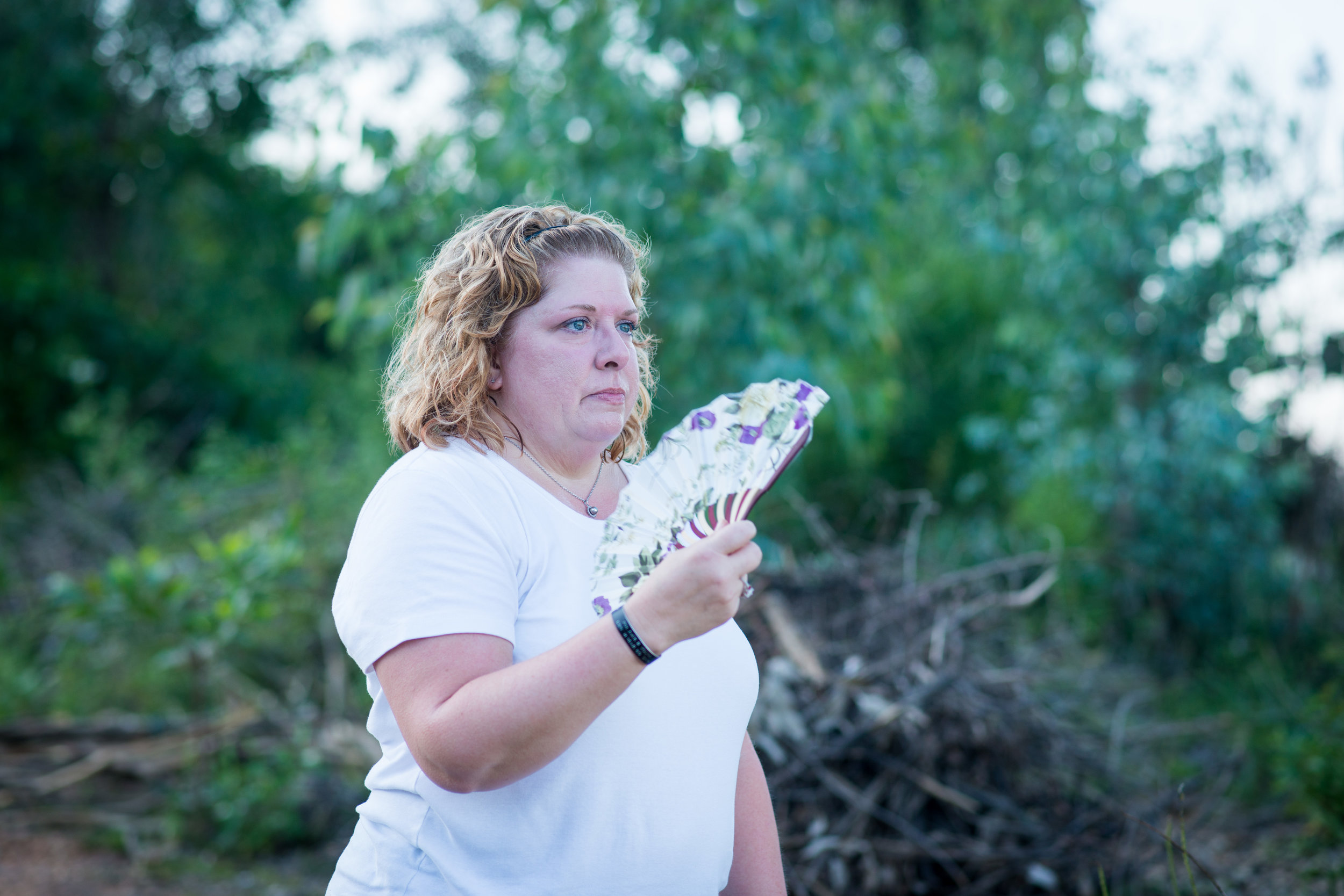  Patty Young Loew looks out over the area where her father was killed. Da Nang.&nbsp; 