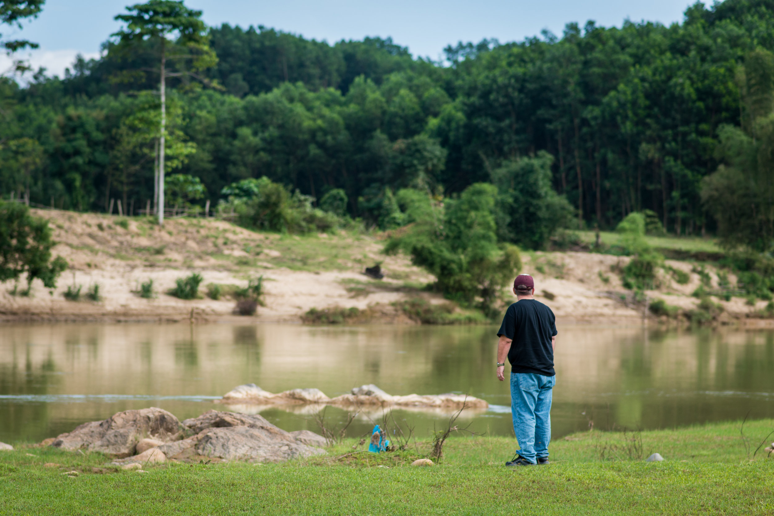  Mike Burkett looks upstream toward the area where his father drowned. Quang Ngai Province. 