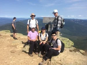 Hiking the Franconia Notch loop in New Hampshire with family.