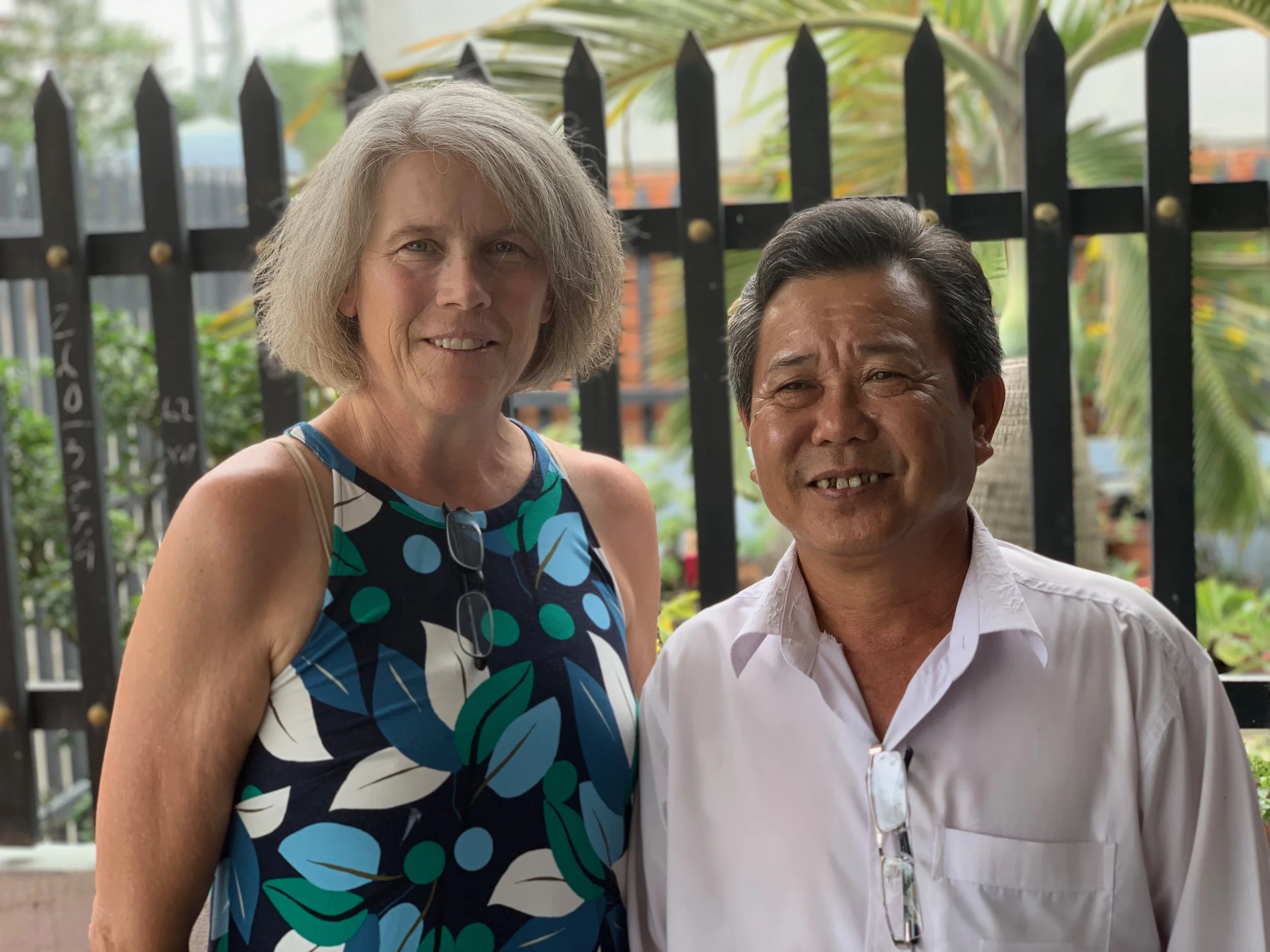 Bonnie Dean and Nguyen Viet Hung, whose fathers died fighting on opposite sides of the Vietnam/American War. Bonnie has few memories of her father, who was killed in 1964 when she was just five years old, very early in the conflict and just before the war had officially started. Hung has many memories of his father, who was killed when Hung was a teenager after the war officially ended, during a fight with the Khmer Rouge of neighboring Cambodia.