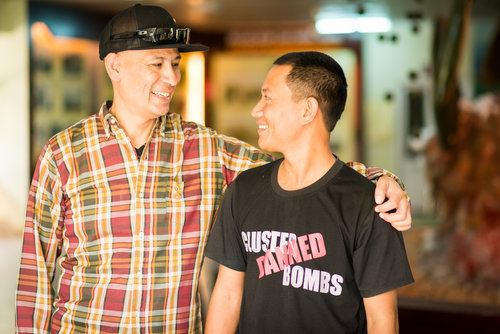 Ron Reyes and Phu Nguyen, who works at Project RENEW in the Quang Tri province. During a presentation about Project RENEW to the 2 Sides Project, Mr. Nguyen told Ron that his father was a guerrilla fighter and fought in Cam Lo, in the same place where Ron’s father fought for the other side.