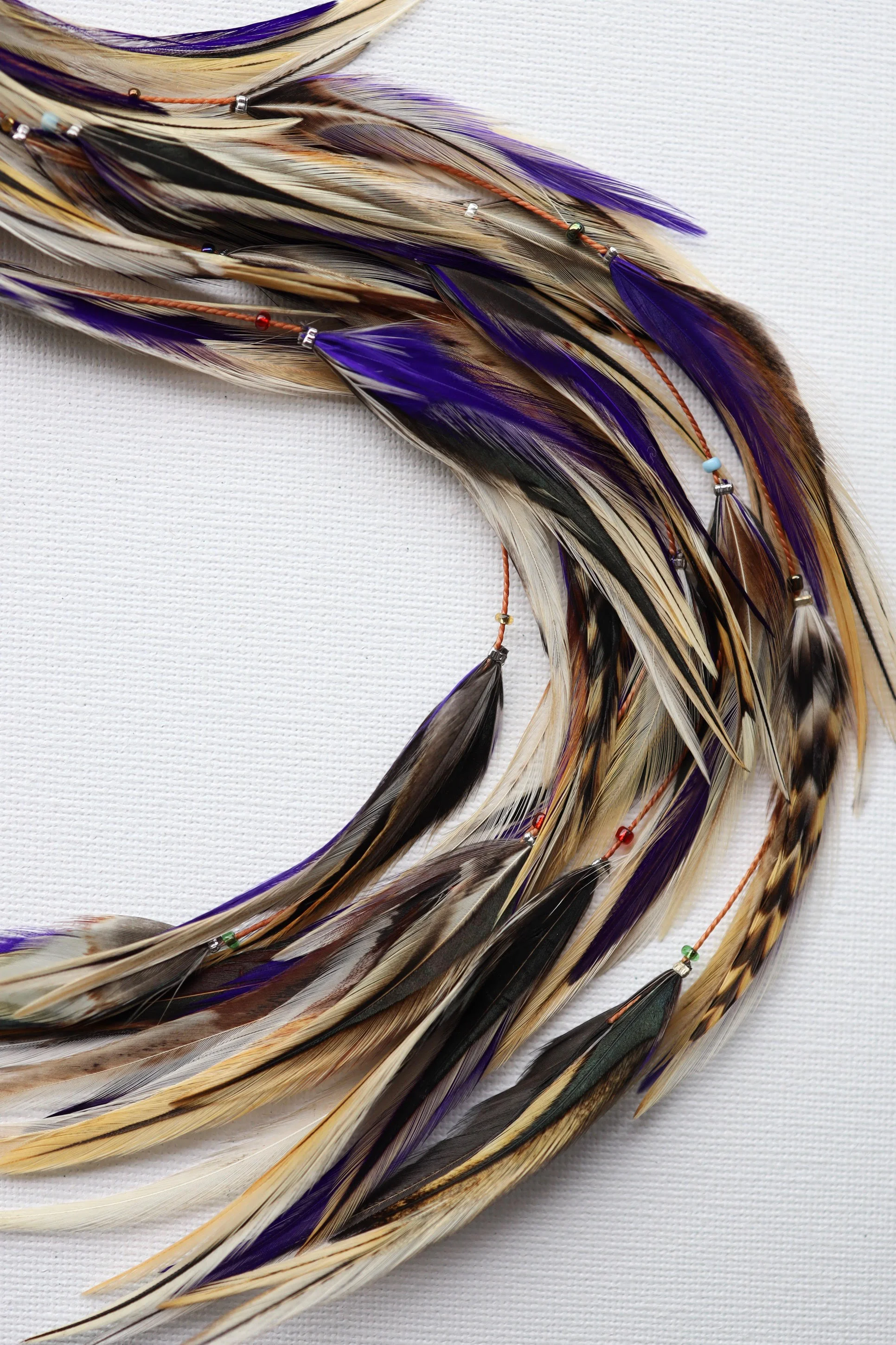 amethyst feather hair extensions macro.jpg