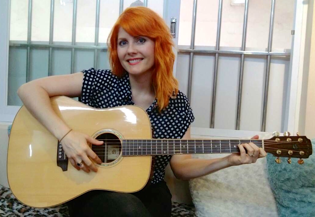 Orange Hair Smile w Guitar.JPG
