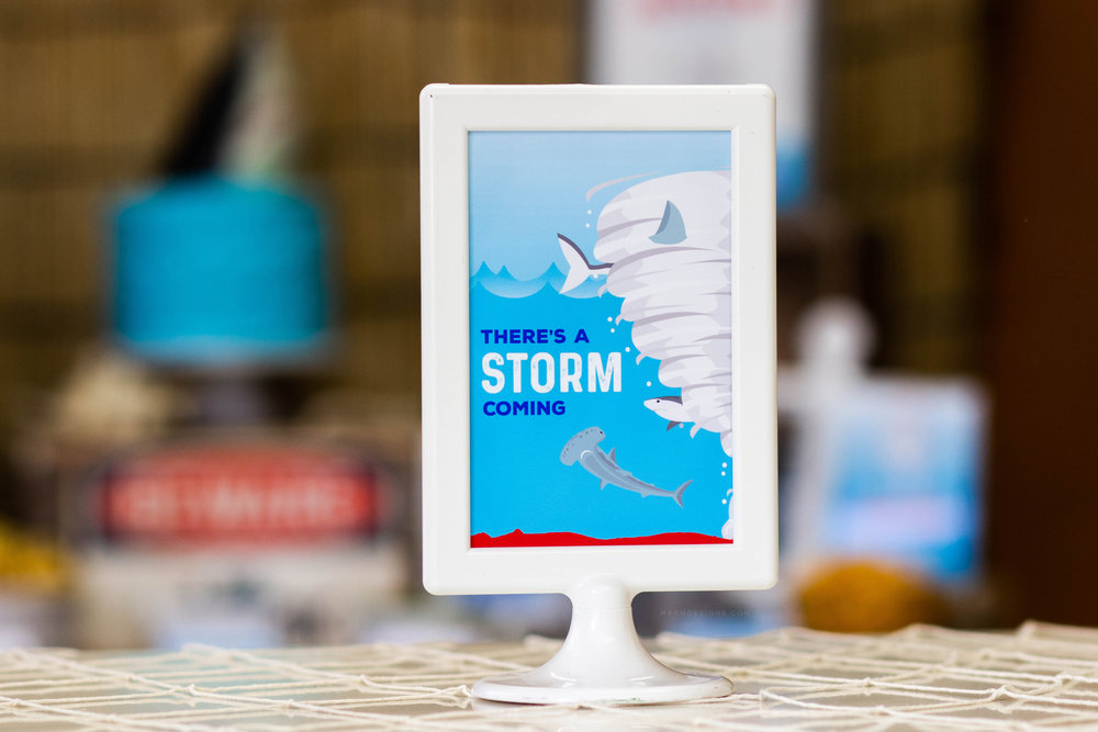 There's A Storm Coming Sharknado table sign // Shark Party Decor - Sharknado Birthday Party Ideas // mkkmdesigns