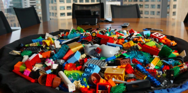 Are you looking for ways to encourage teamwork at your company? Feeling like your business meetings lack energy and direction? Do you just love playing with blocks? Join LEGO® Serious Play® master Michael Fearne as he demonstrates how PLAY can jumpstart your team. LEGO® Serious Play®, a methodology to bridge and harvest an organisation’s collective intelligence to solve problems and improve decision-making, actively engages every participant and embraces a “leaning forward” approach where everybody contributes. The bricks are used as a medium to build and to express complex ideas through storytelling and metaphors. It unleashes creative energies, modes of thought and ways of seeing that most adults have forgotten they even possessed. Dare to play!